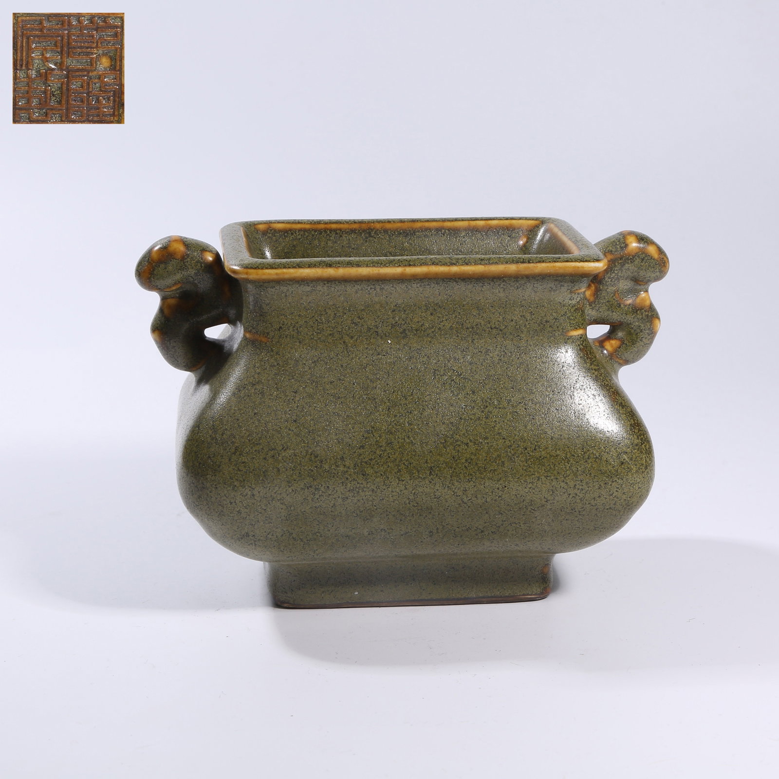 A TEA-DUST GLAZE BEAST-HANDLED CENSER: Tea-dust glaze beast-handled censer
