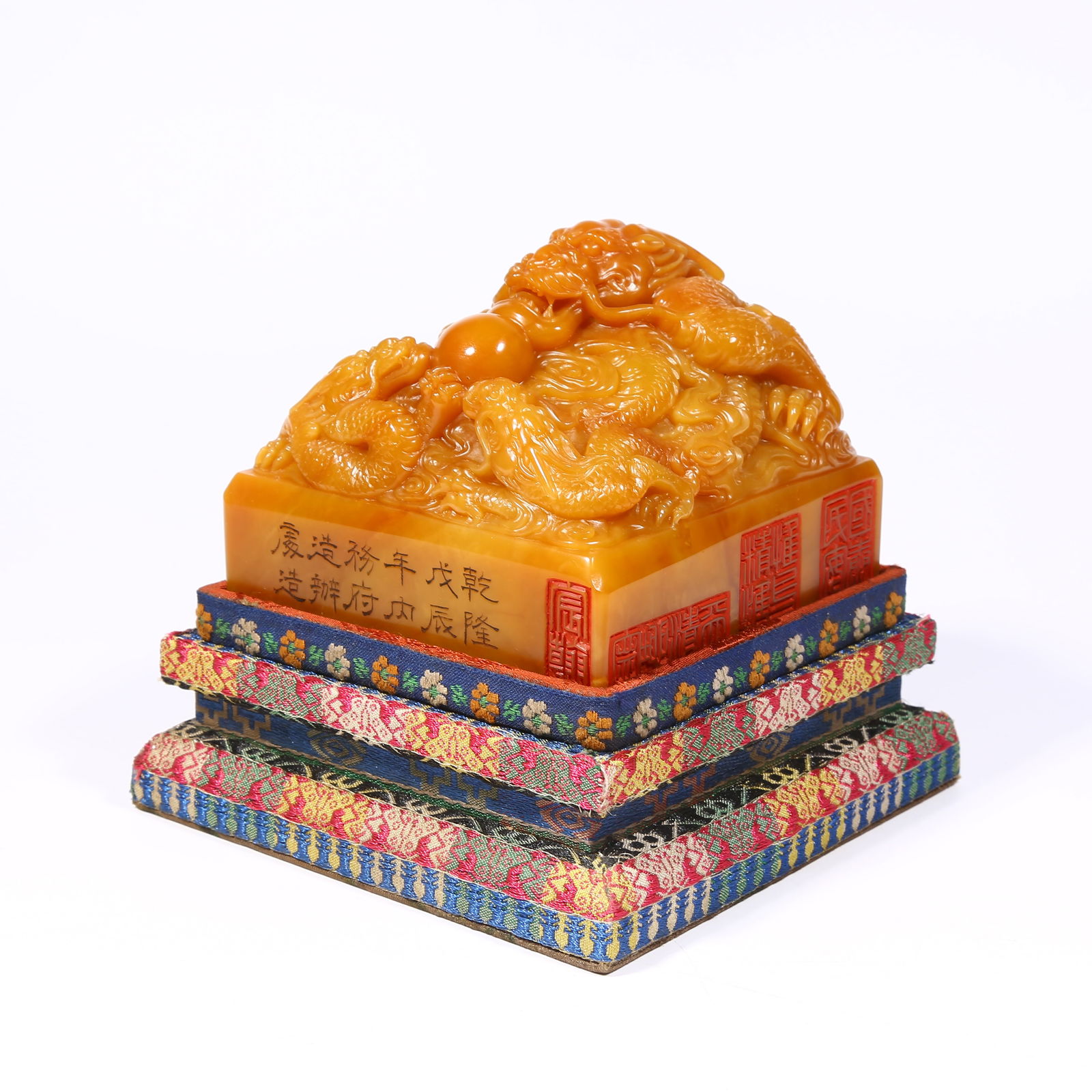 A SHOUSHAN TIANHUANG STONE SEAL WITH DRAGON KNOB: Shoushan Tianhuang stone seal with dragon knob