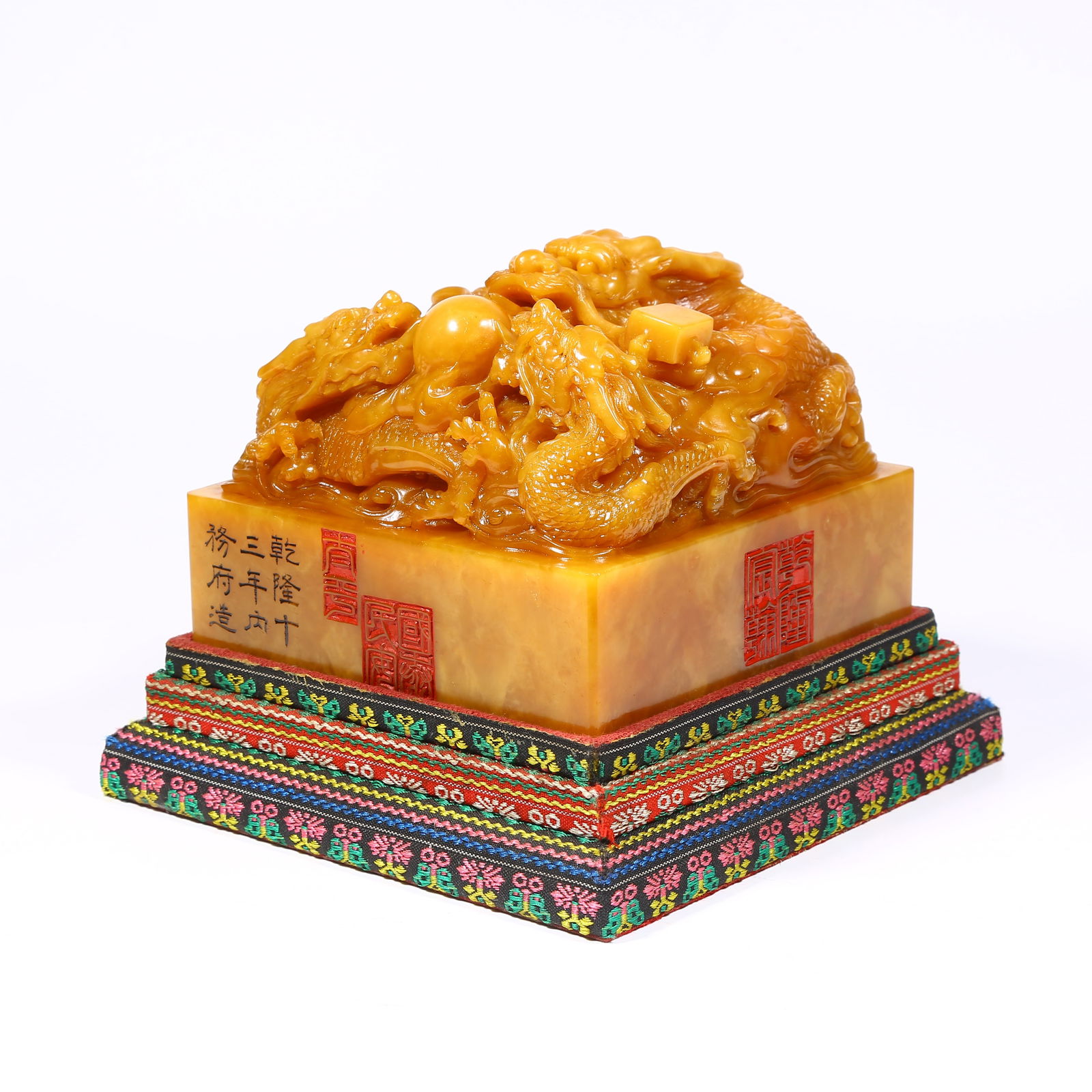 A SHOUSHAN TIANHUANG STONE SEAL WITH DRAGON KNOB: Shoushan Tianhuang stone seal with dragon knob