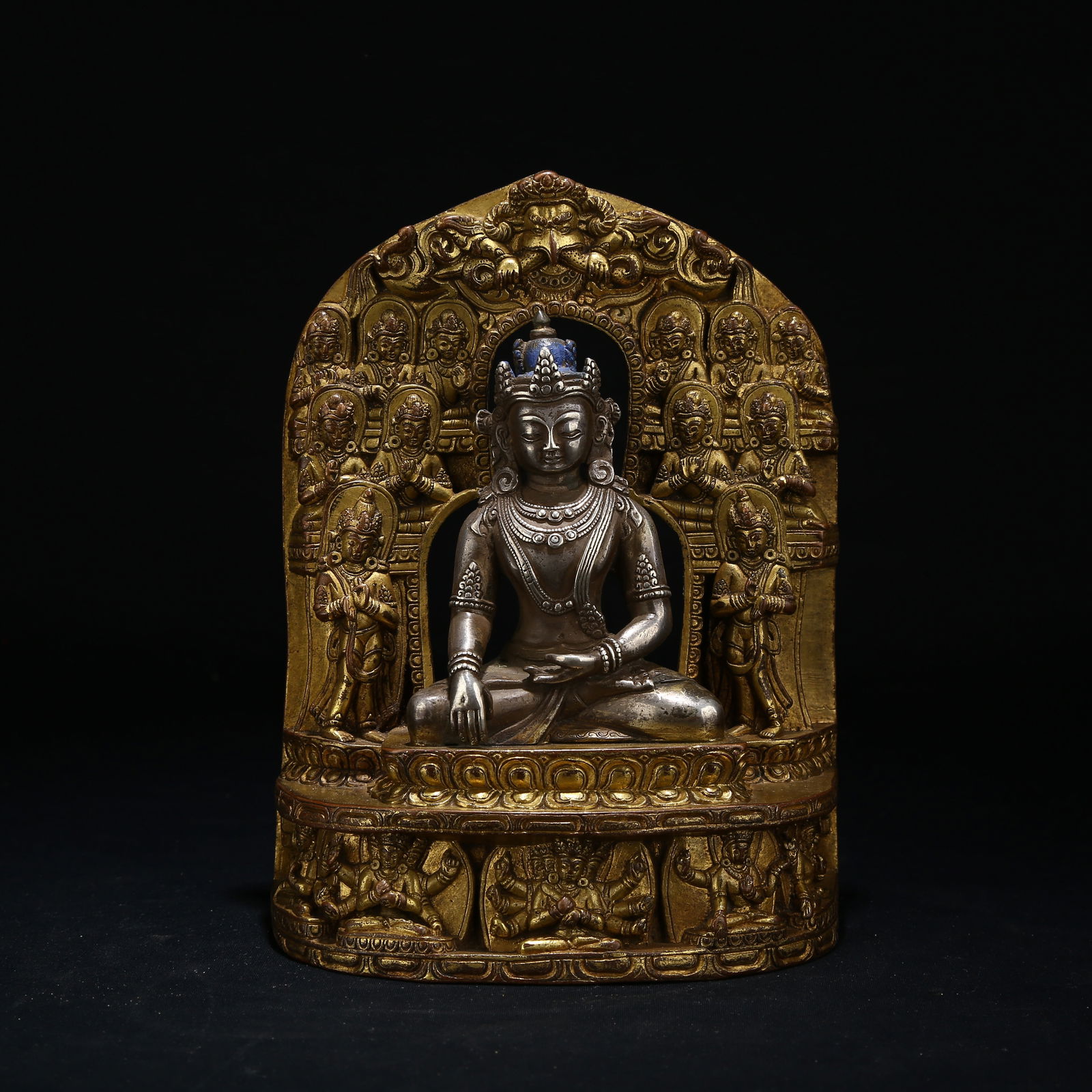 A TIBETAN SILVER STATUE OF SHAKYAMUNI BUDDHA WITH JEWELED CROWN (1 of 9)