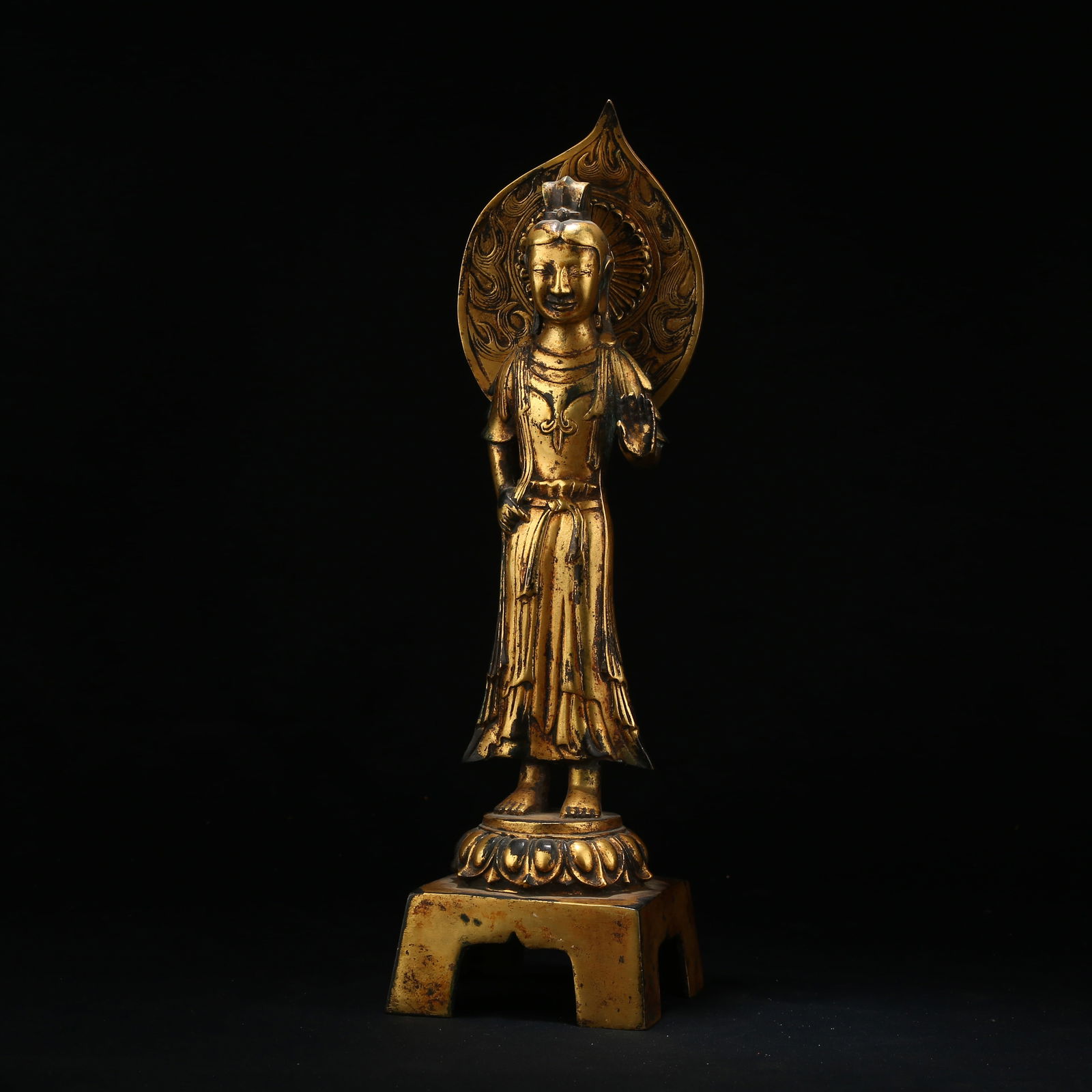 A GILT BRONZE STANDING BODHISATTVA (1 of 8)