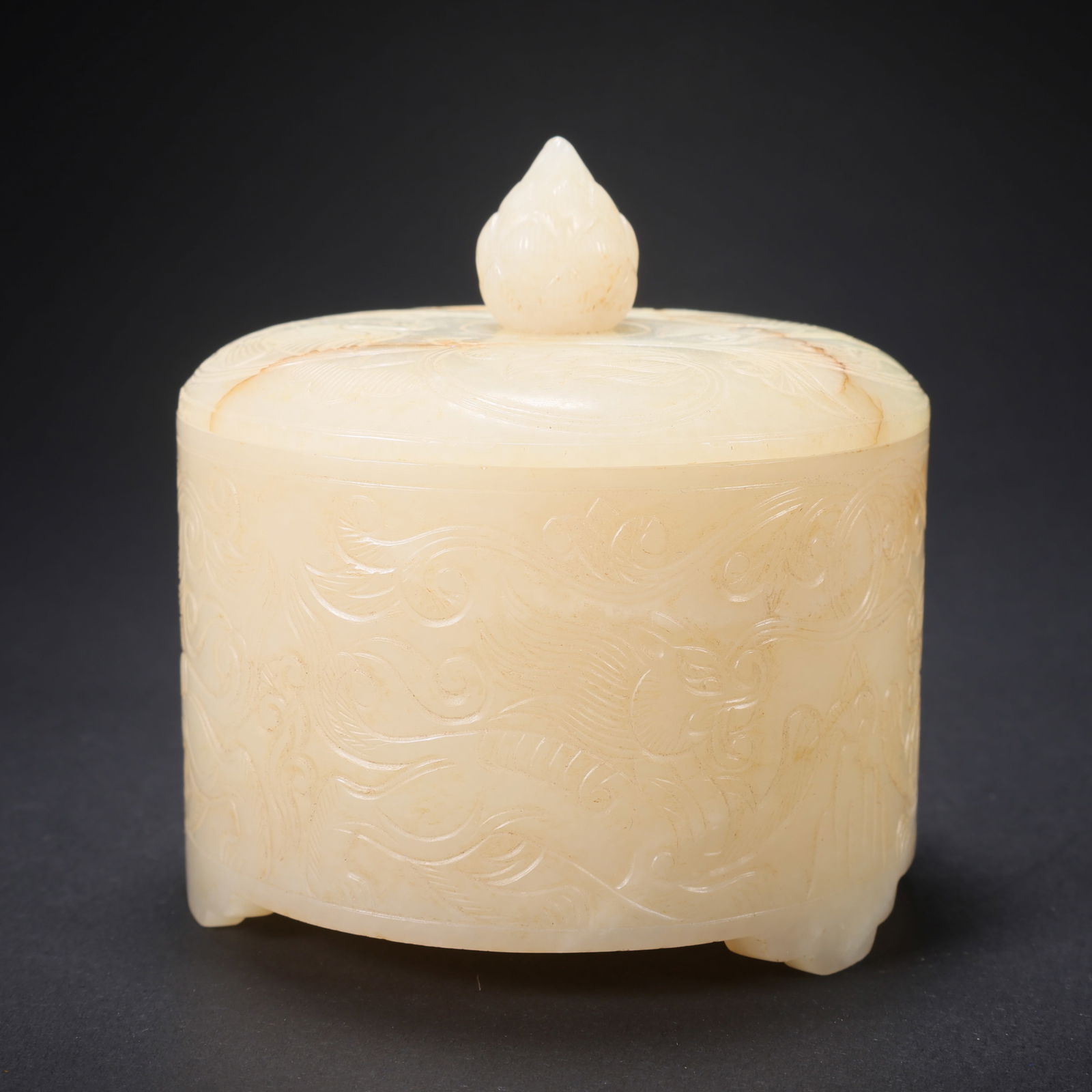 A HETIAN JADE COVERED BOX WITH FOUR BEASTS AND TWIN BIRDS: Hetian Jade Covered Box with Four Beasts and Twin Birds