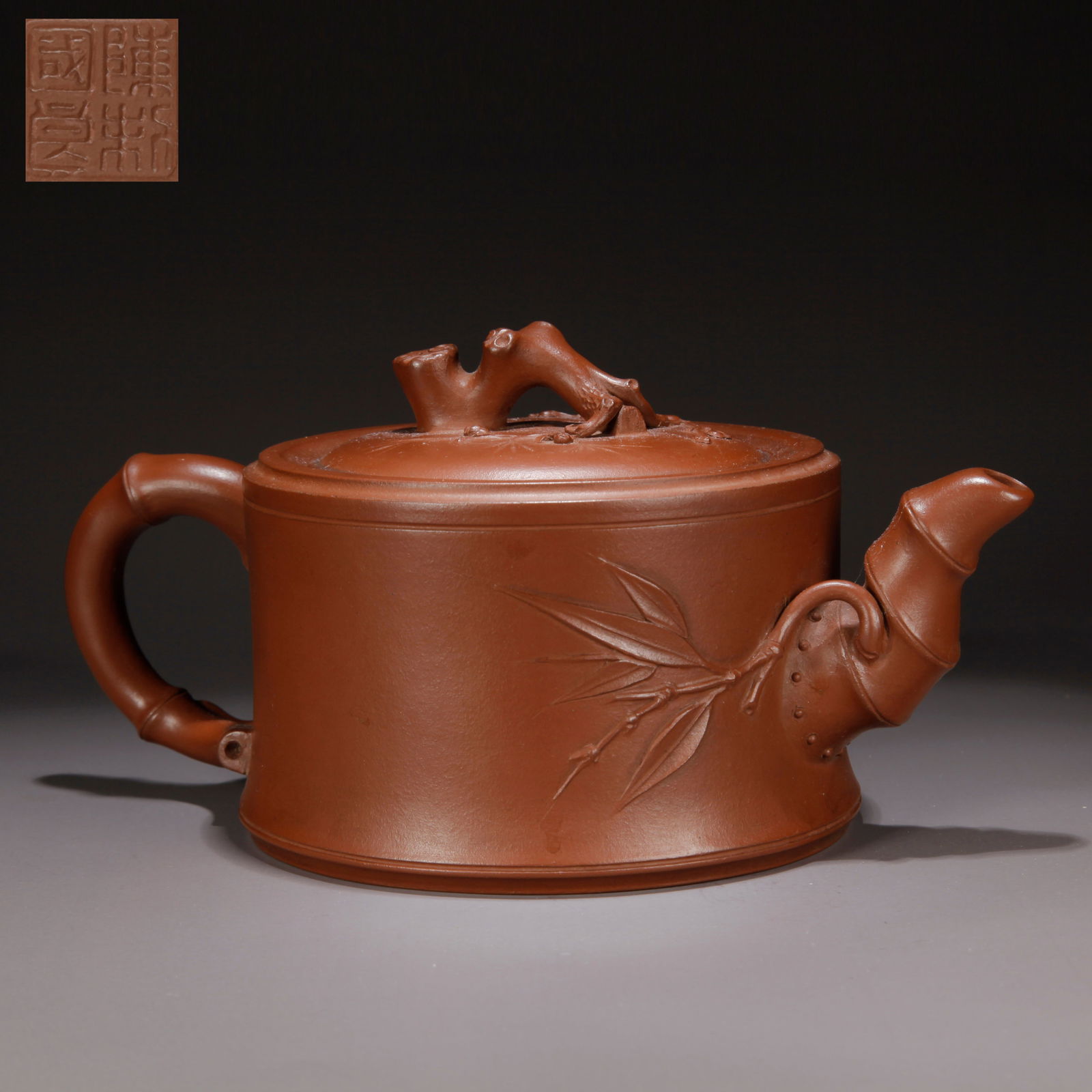 A ZISHA CLAY EWER WITH PLUM BLOSSOM KNOB: Zisha Clay Ewer with Plum Blossom Knob