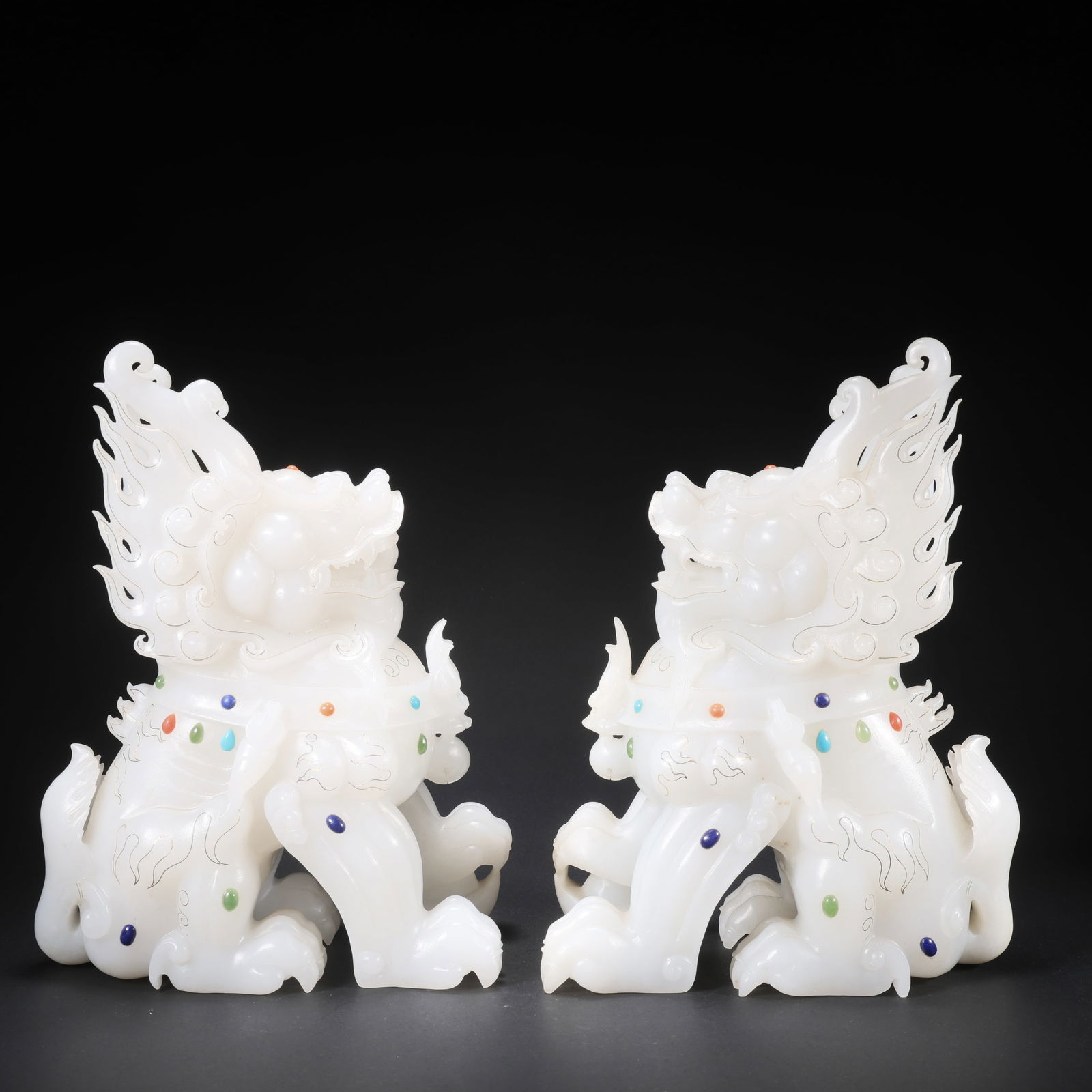 A PAIR OF HETIAN JADE QILIN INLAID WITH GOLD, SILVER, AND GEMSTONES (1 of 9)