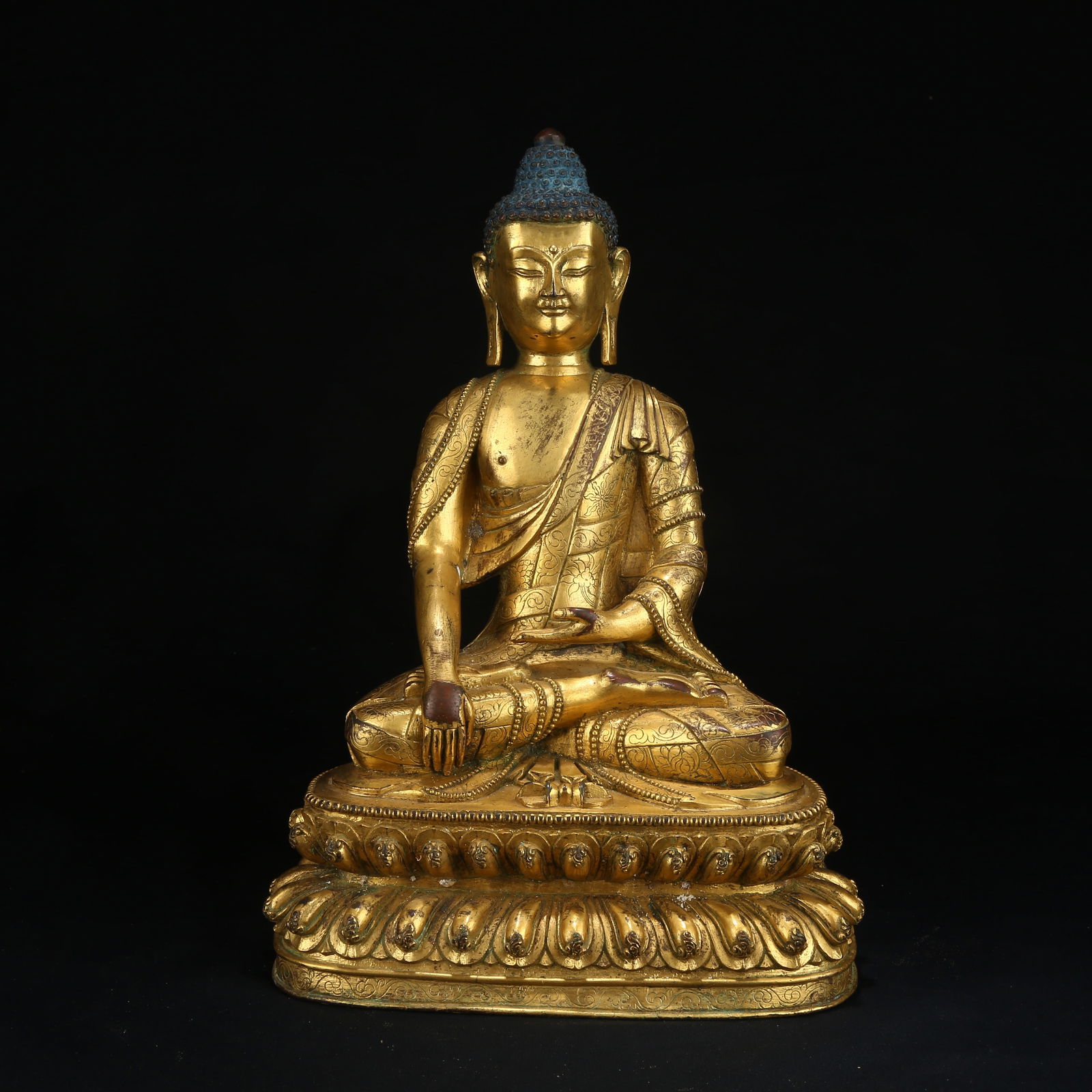 A GILT BRONZE FIGURE OF SHAKYAMUNI BUDDHA (1 of 8)