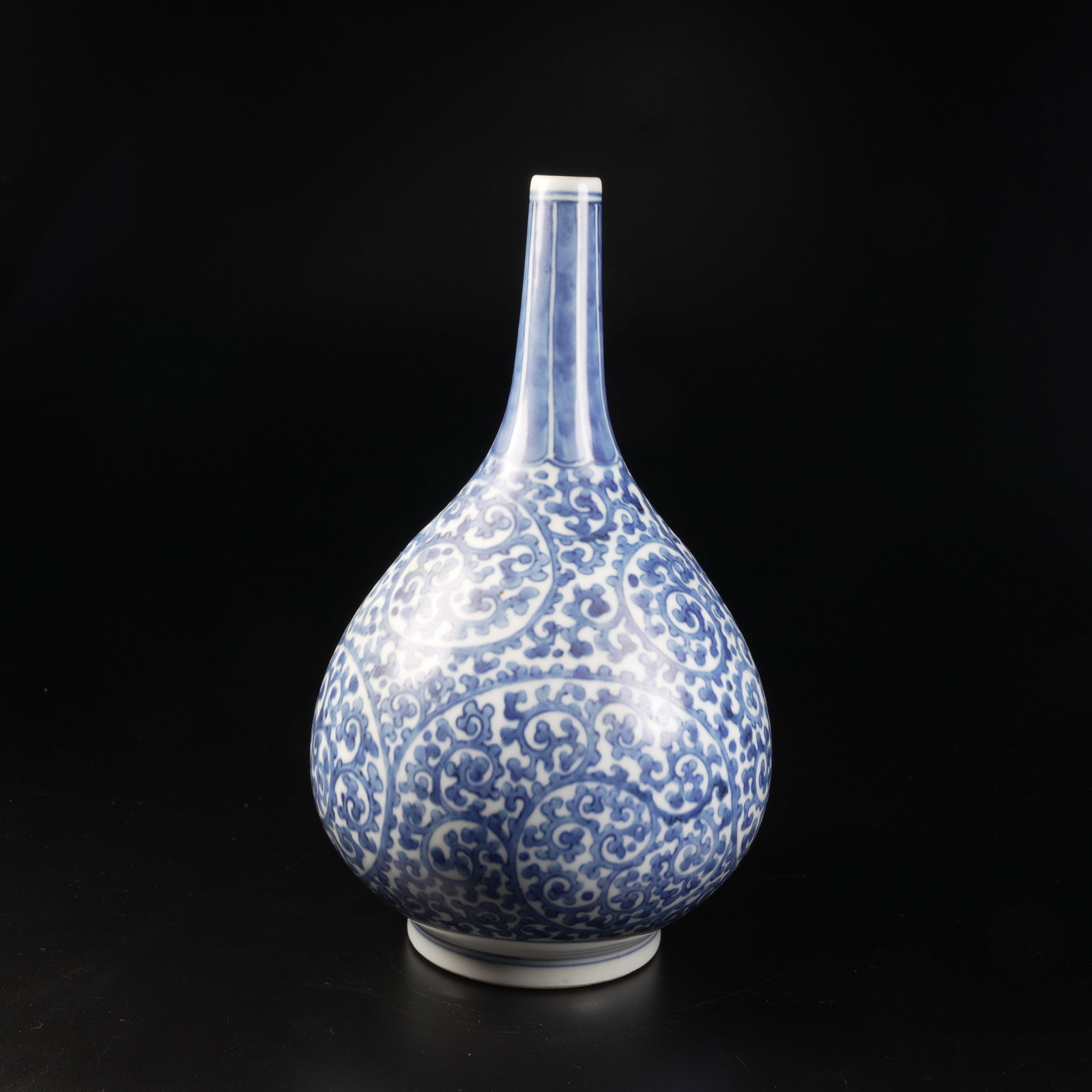 A BLUE-AND-WHITE "ENTWINED FLOWERING BRANCHES" DAN-TYPE VASE: Blue-and-white "entwined flowering branches" dan-type vase