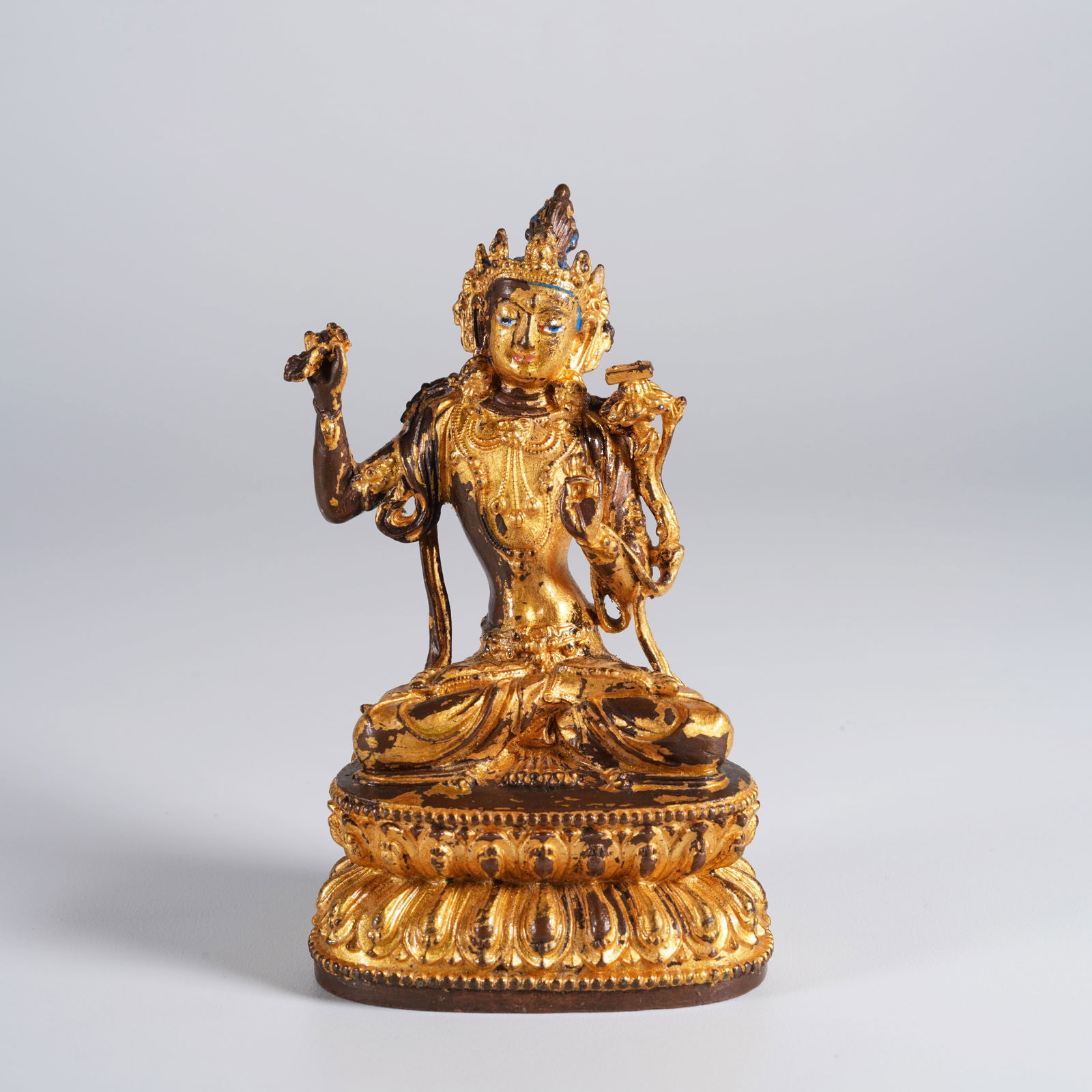 A GILT-BRONZE STATUE OF MANJUSHRI (1 of 9)