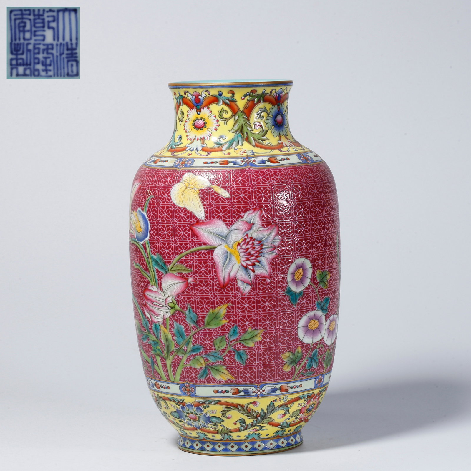 A YANGCAI VASE WITH FLOWER AND BUTTERFLY MOTIF: Yangcai vase with flower and butterfly motif