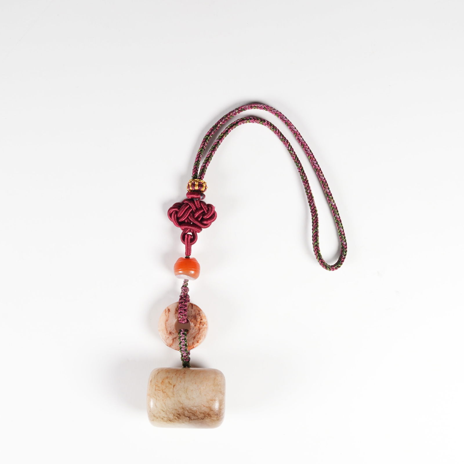 A HETIAN JADE WAIST-DRUM PENDANT: Hetian Jade Waist-Drum Pendant