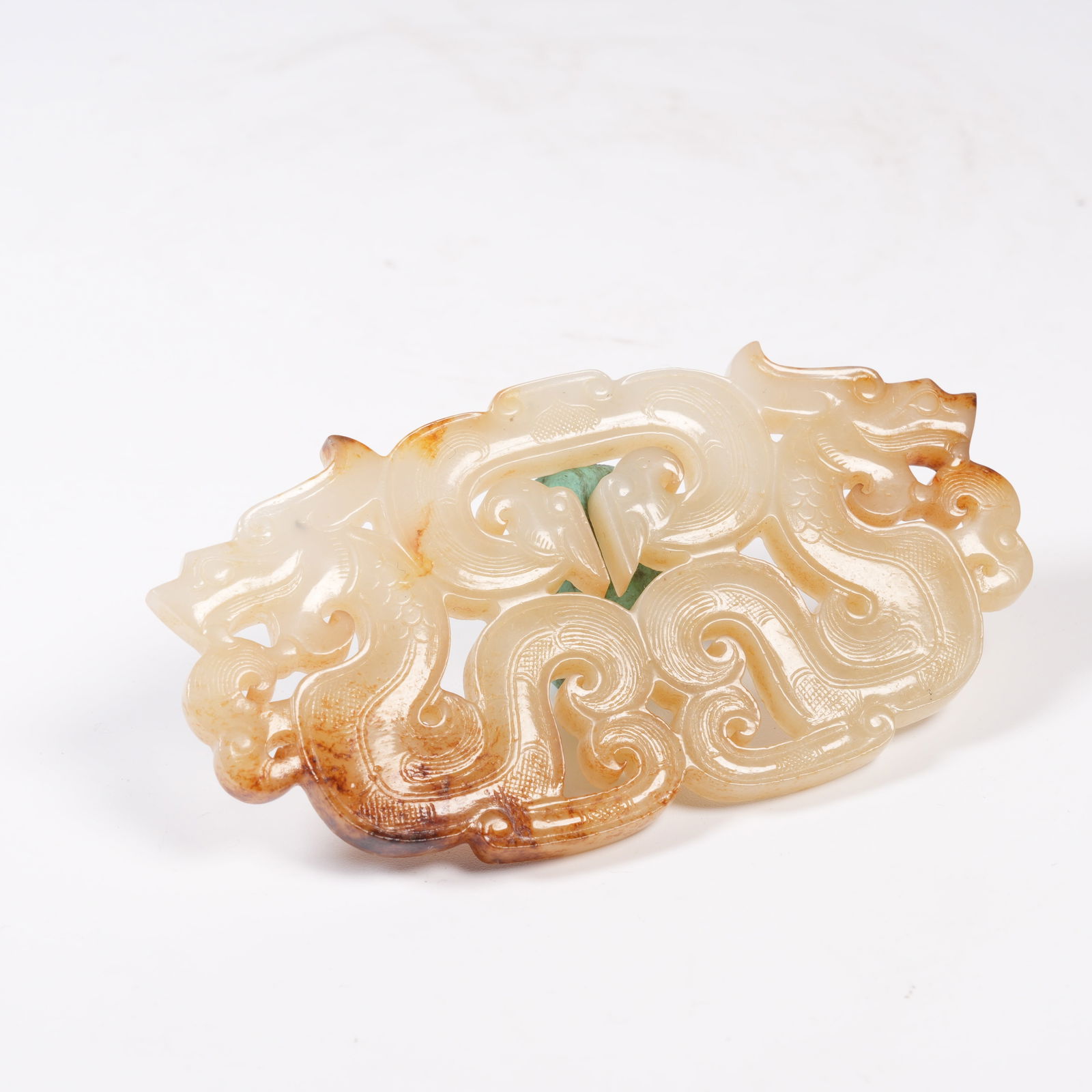 A ANCIENT JADE PENDANT WITH DRAGON MOTIF (1 of 7)