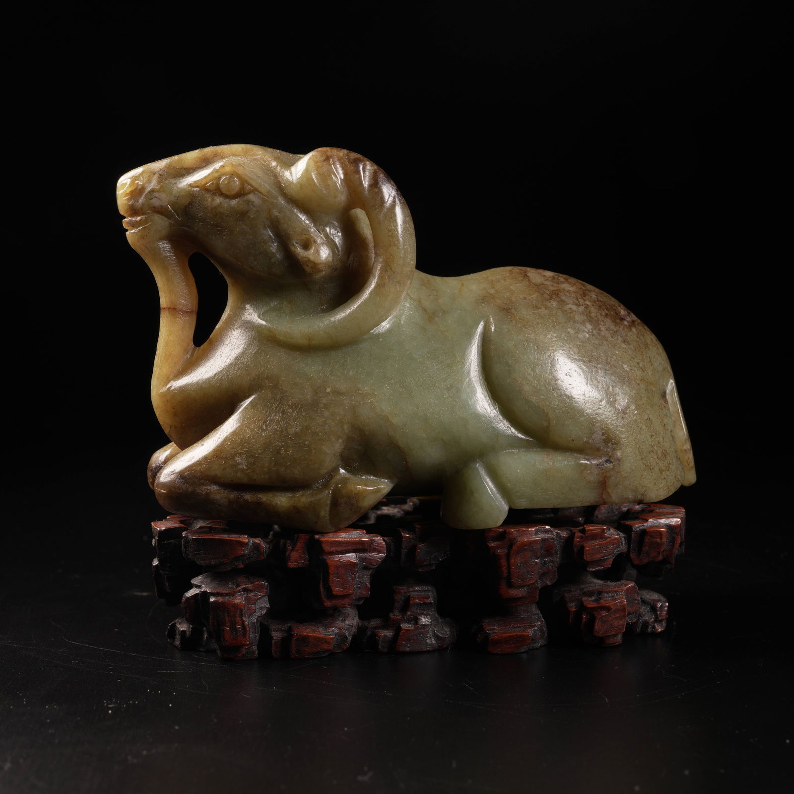 A ANCIENT JADE RECUMBENT SHEEP ORNAMENT: Ancient jade recumbent sheep ornament