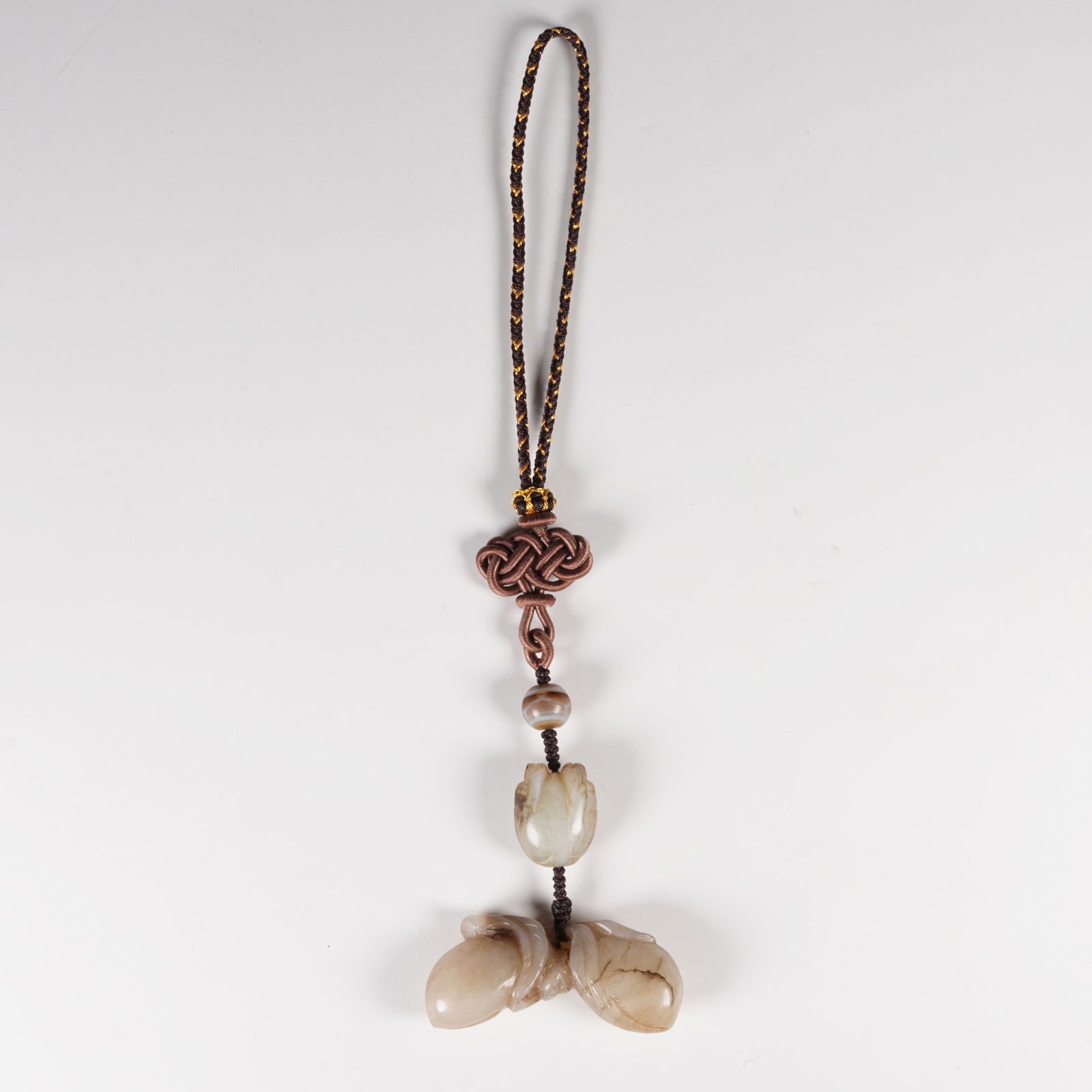 A HETIAN JADE MELON AND FRUIT PENDANT (1 of 11)