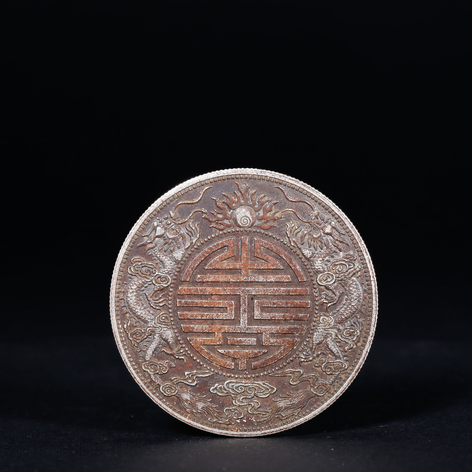 A SILVER DOLLAR COIN (1 of 3)