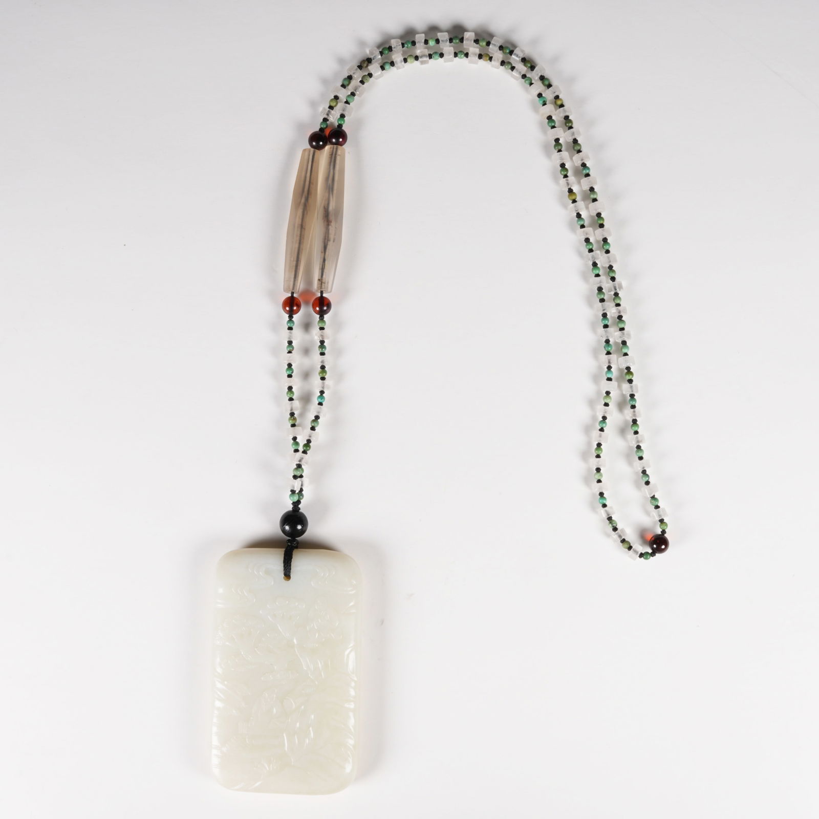 A HETIAN JADE PLAQUE WITH FIGURE MOTIF: Hetian Jade Plaque with Figure Motif