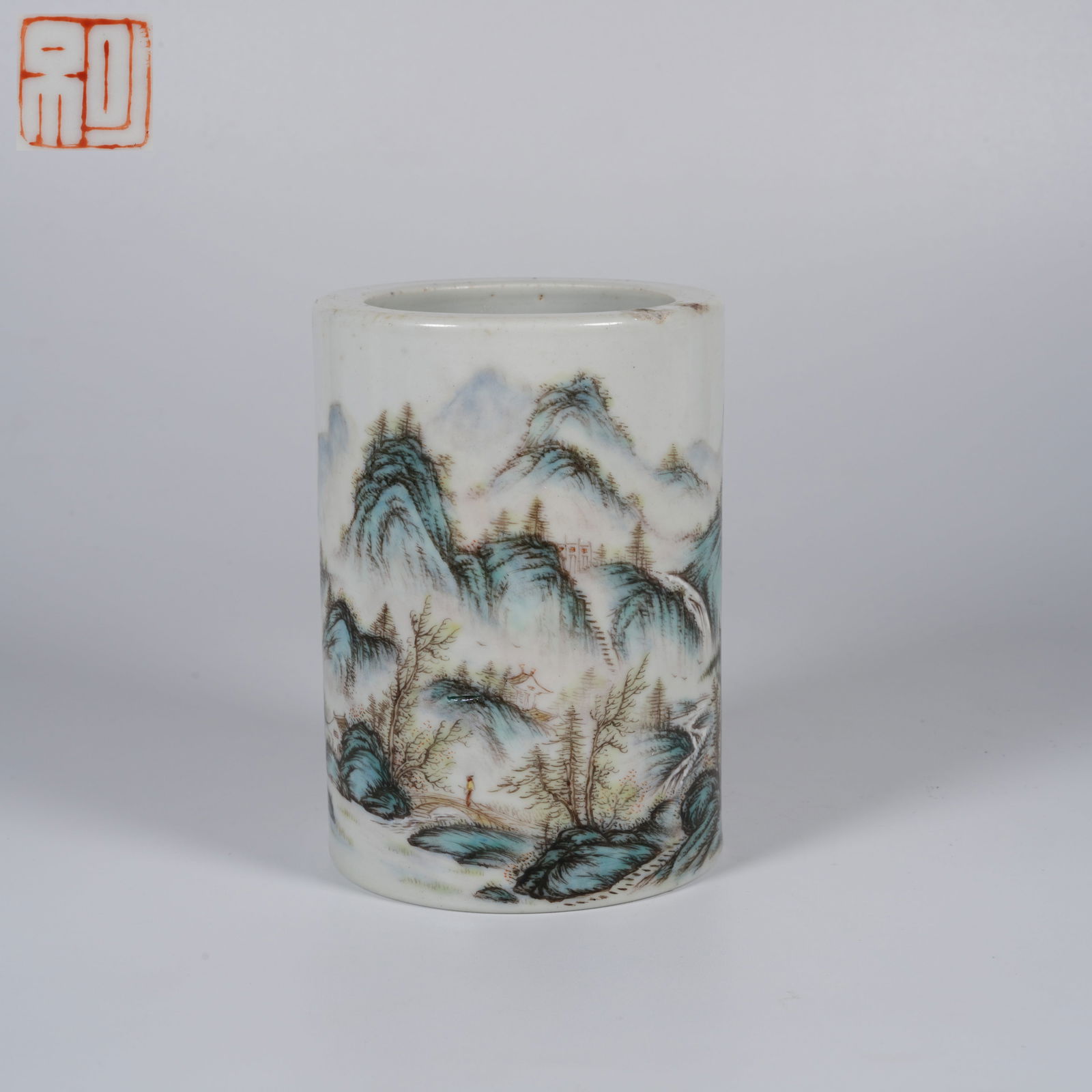 A FAMILLE ROSE LANDSCAPE BRUSH POT: Famille rose landscape brush pot