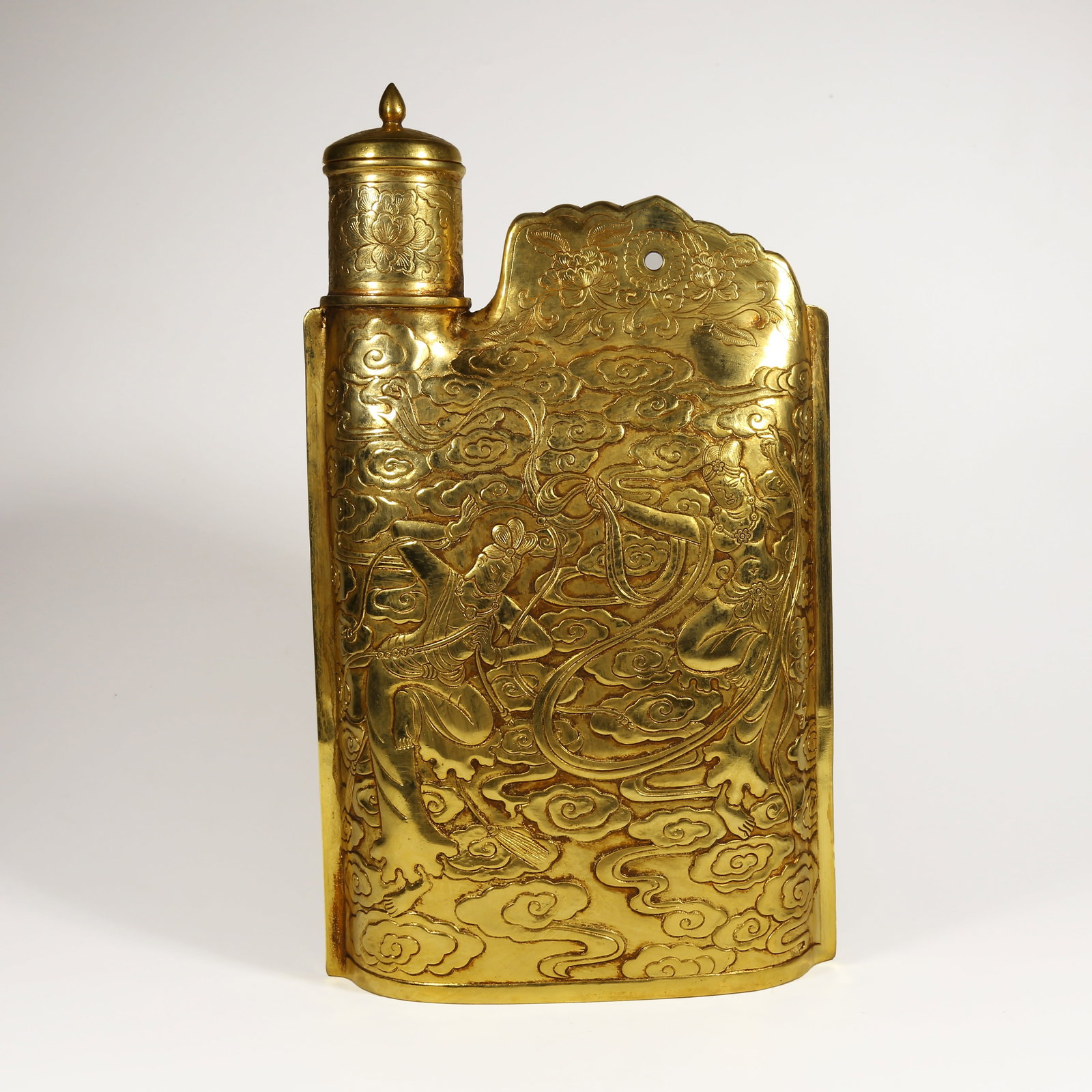 A GILDED BRONZE FLYING APSARAS SKIN FLASK: Gilded Bronze Flying Apsaras Skin Flask