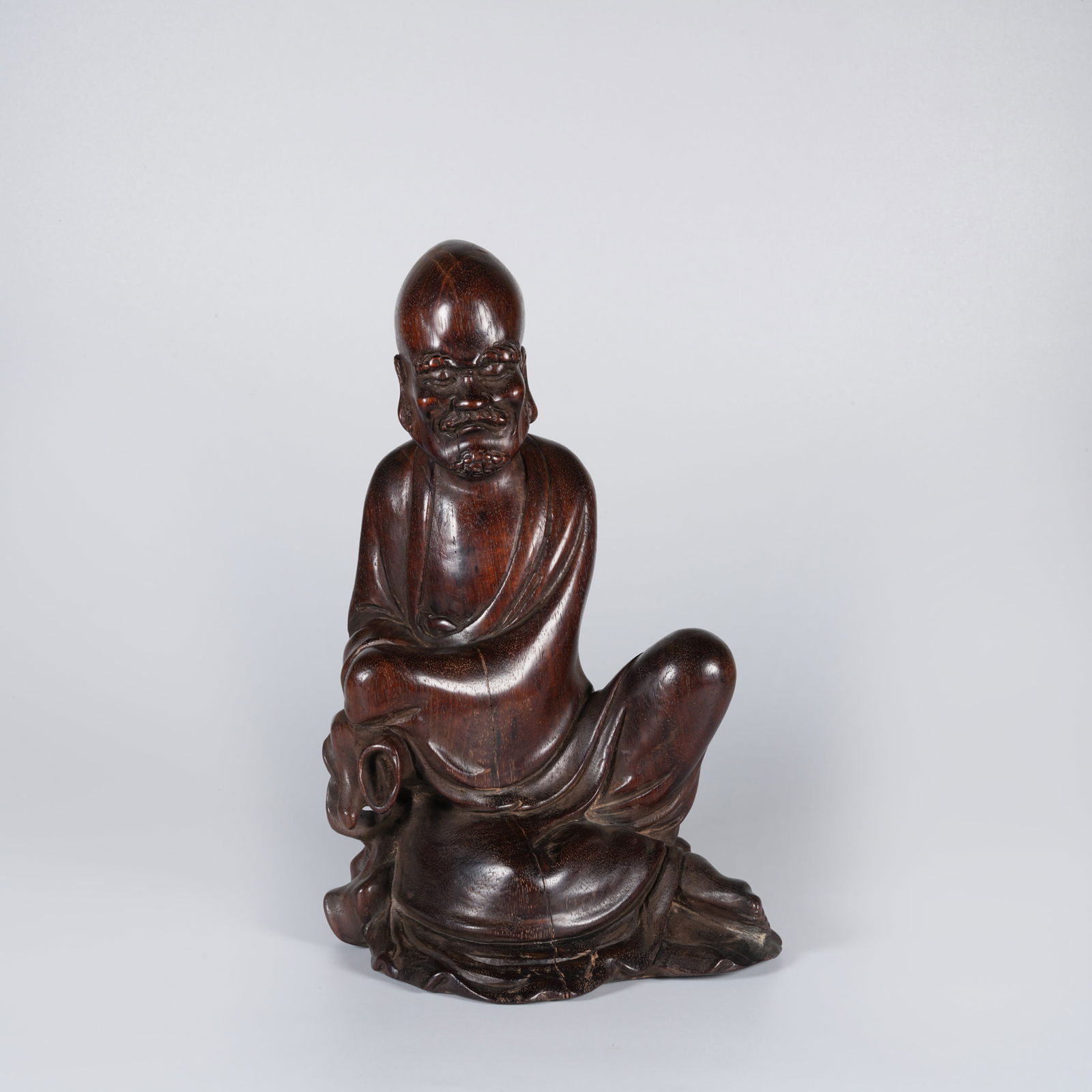 A HUANGHUALI WOOD LUOHAN STATUE (1 of 9)