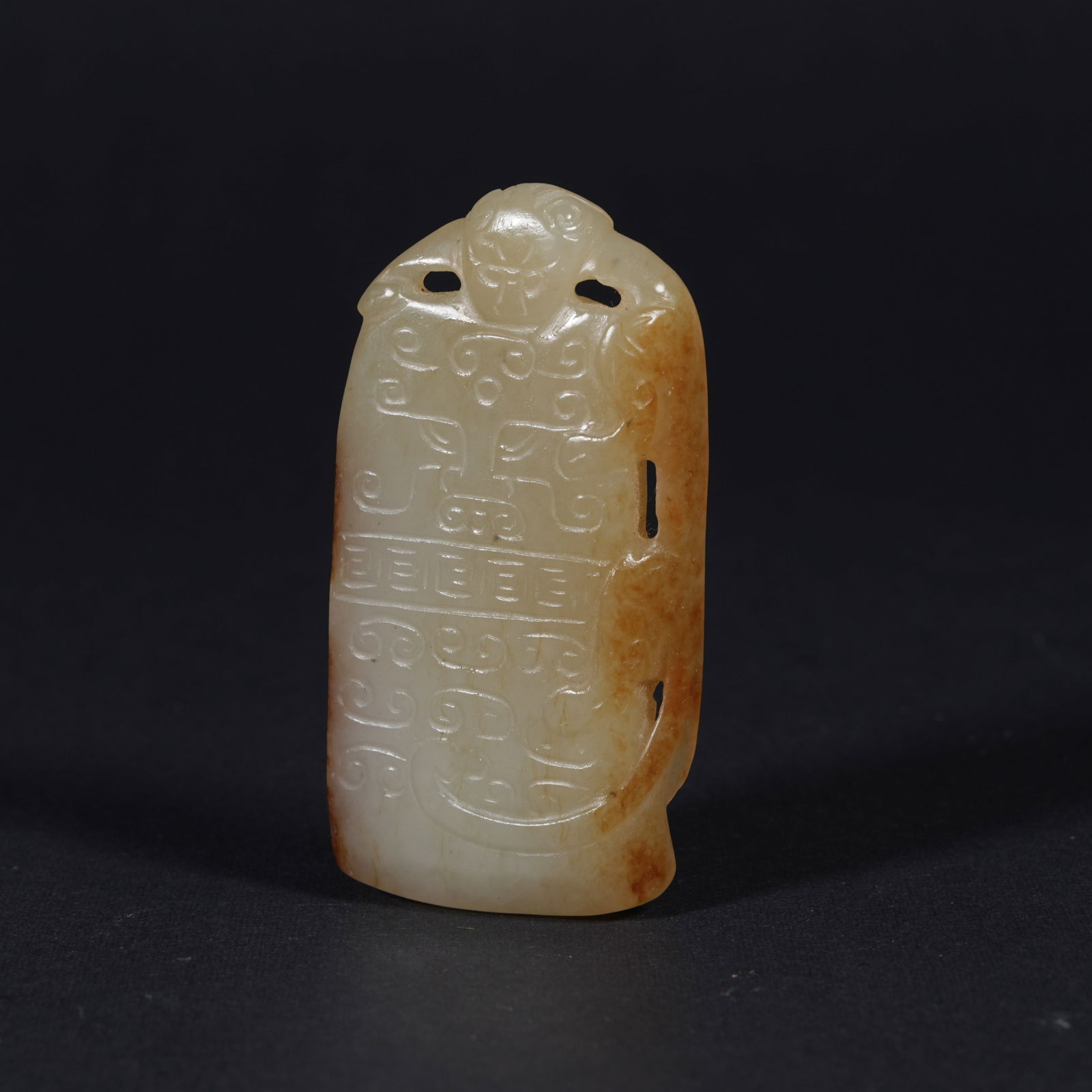 A HETIAN JADE PENDANT WITH "LONGEVITY IN THE HOUSEHOLD" MOTIF: Hetian jade pendant with "longevity in the household" motif