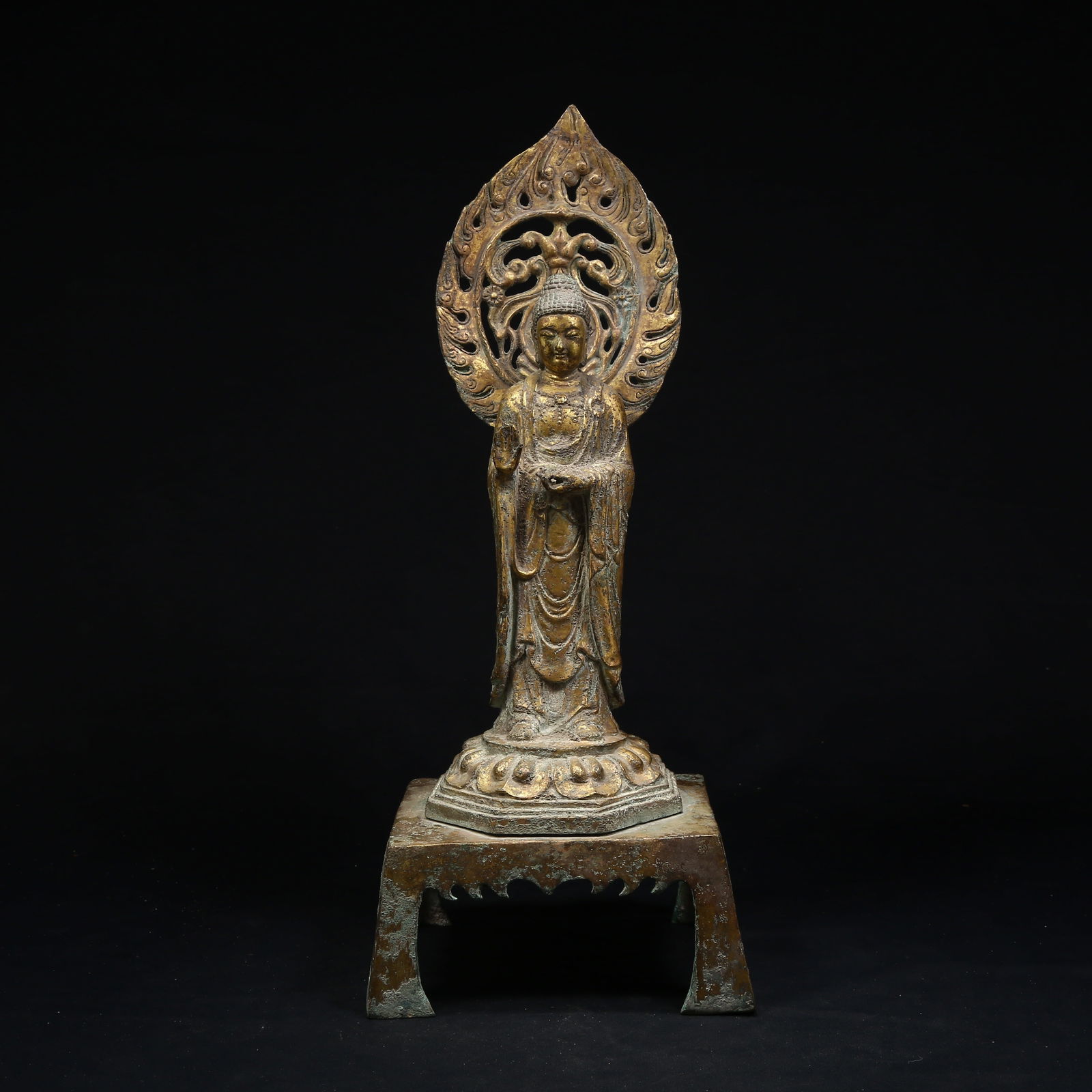 A GILT BRONZE STANDING SHAKYAMUNI BUDDHA (1 of 8)
