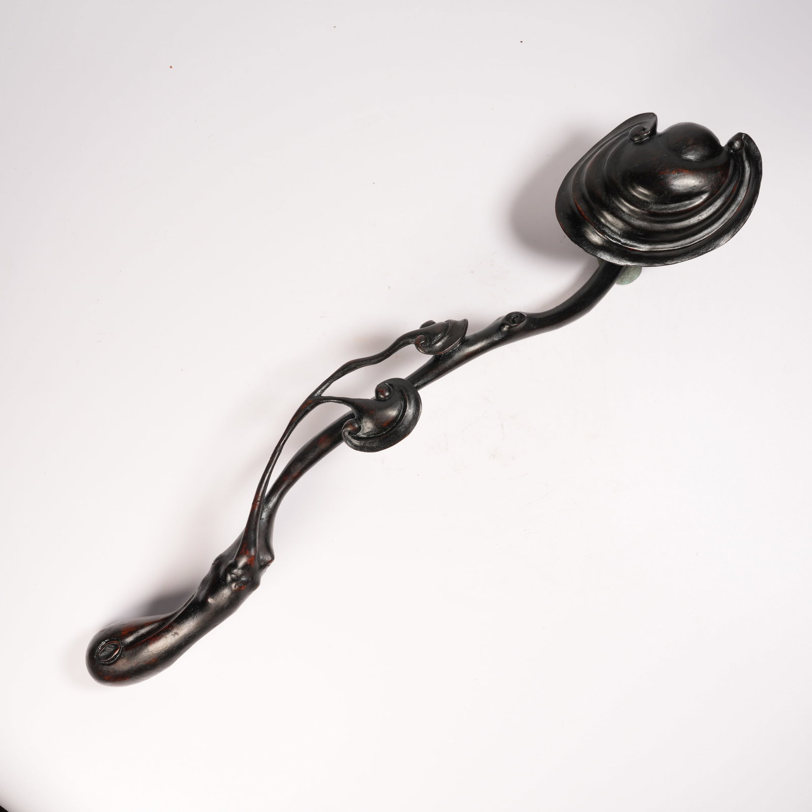 A ZITAN LINGZHI-SHAPED RUYI ORNAMENT: Zitan Lingzhi-Shaped Ruyi Ornament