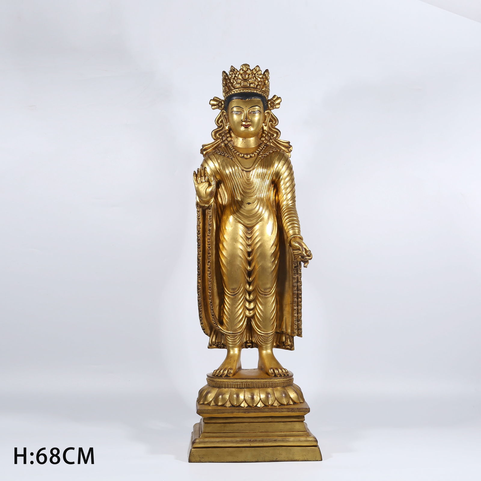 A GILT BRONZE STANDING SHAKYAMUNI STATUE (1 of 8)