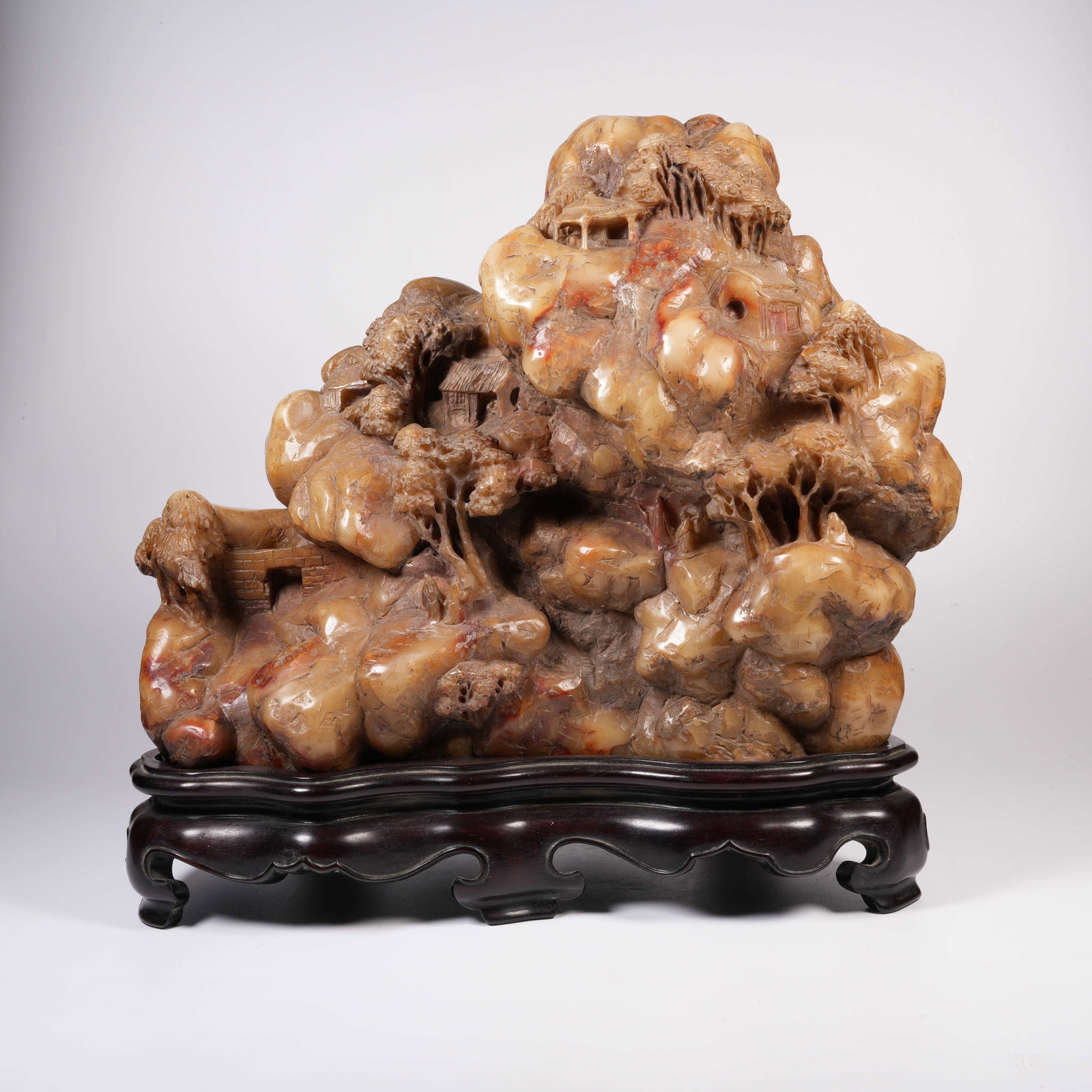 A SHOUSHAN STONE NATURAL-FORM MINIATURE ORNAMENT: Shoushan stone natural-form miniature ornament