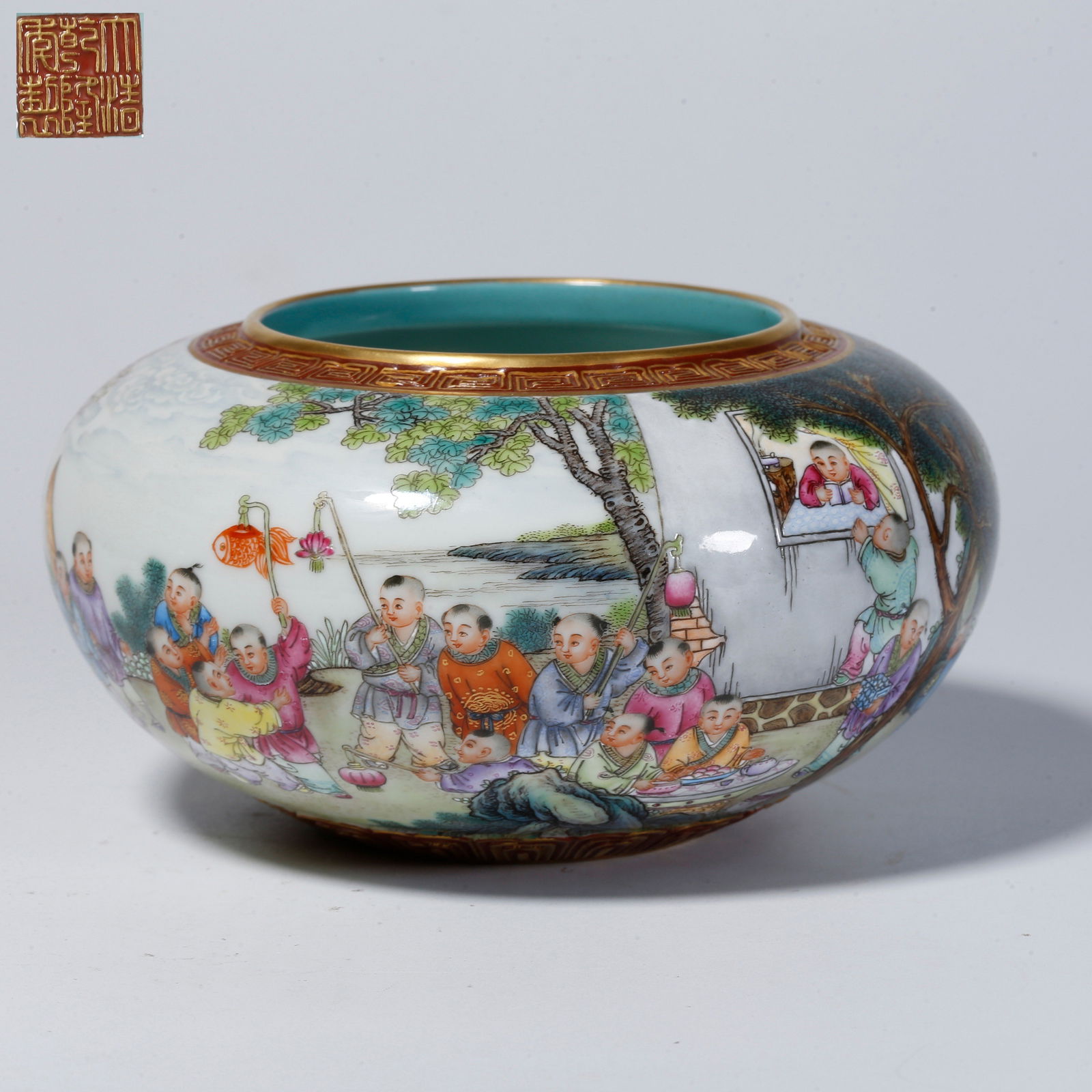 A FAMILLE-ROSE WATER POT WITH BOYS AT PLAY MOTIF: Famille-rose water pot with boys at play motif
