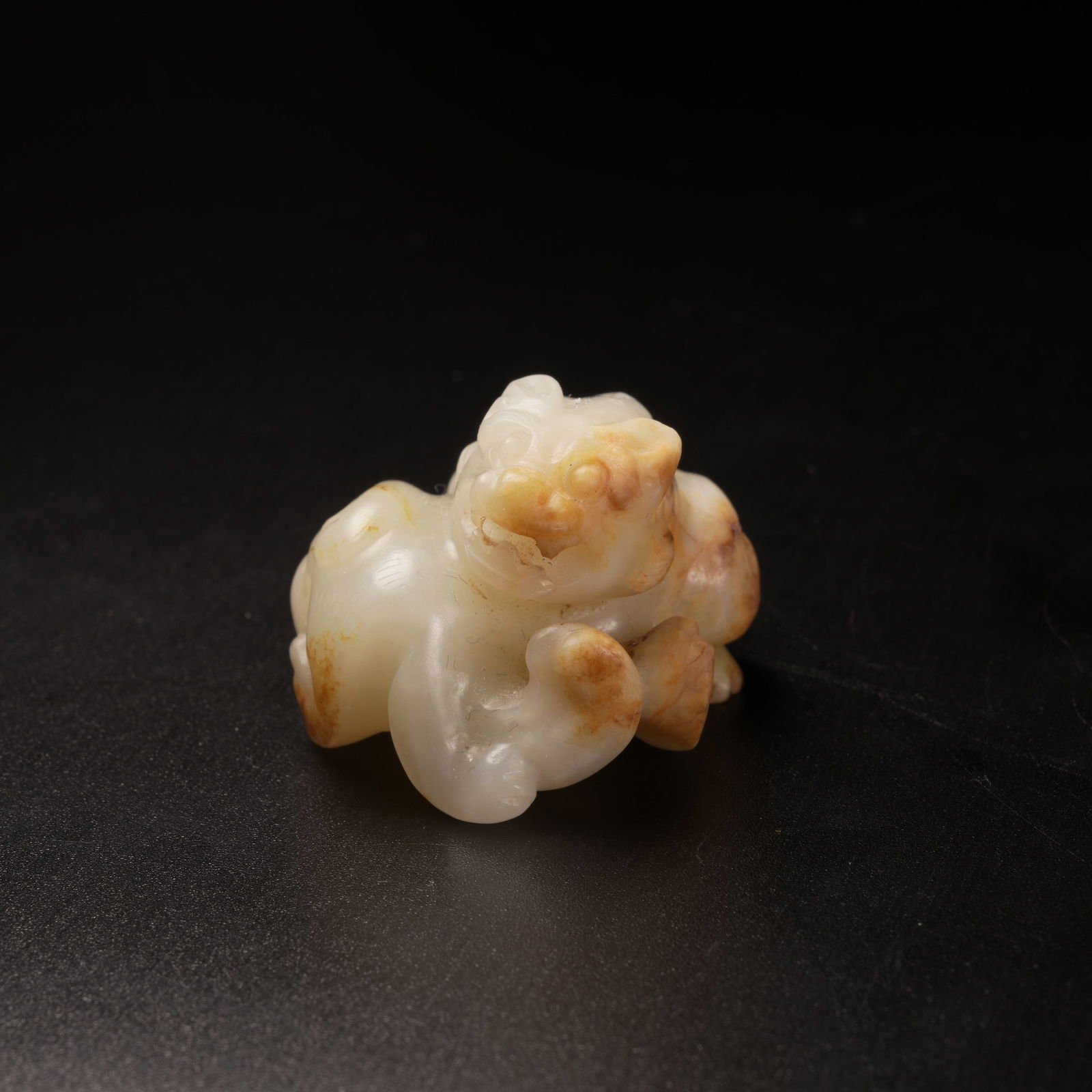 A ANCIENT JADE MYTHICAL-BEAST PENDANT (1 of 8)