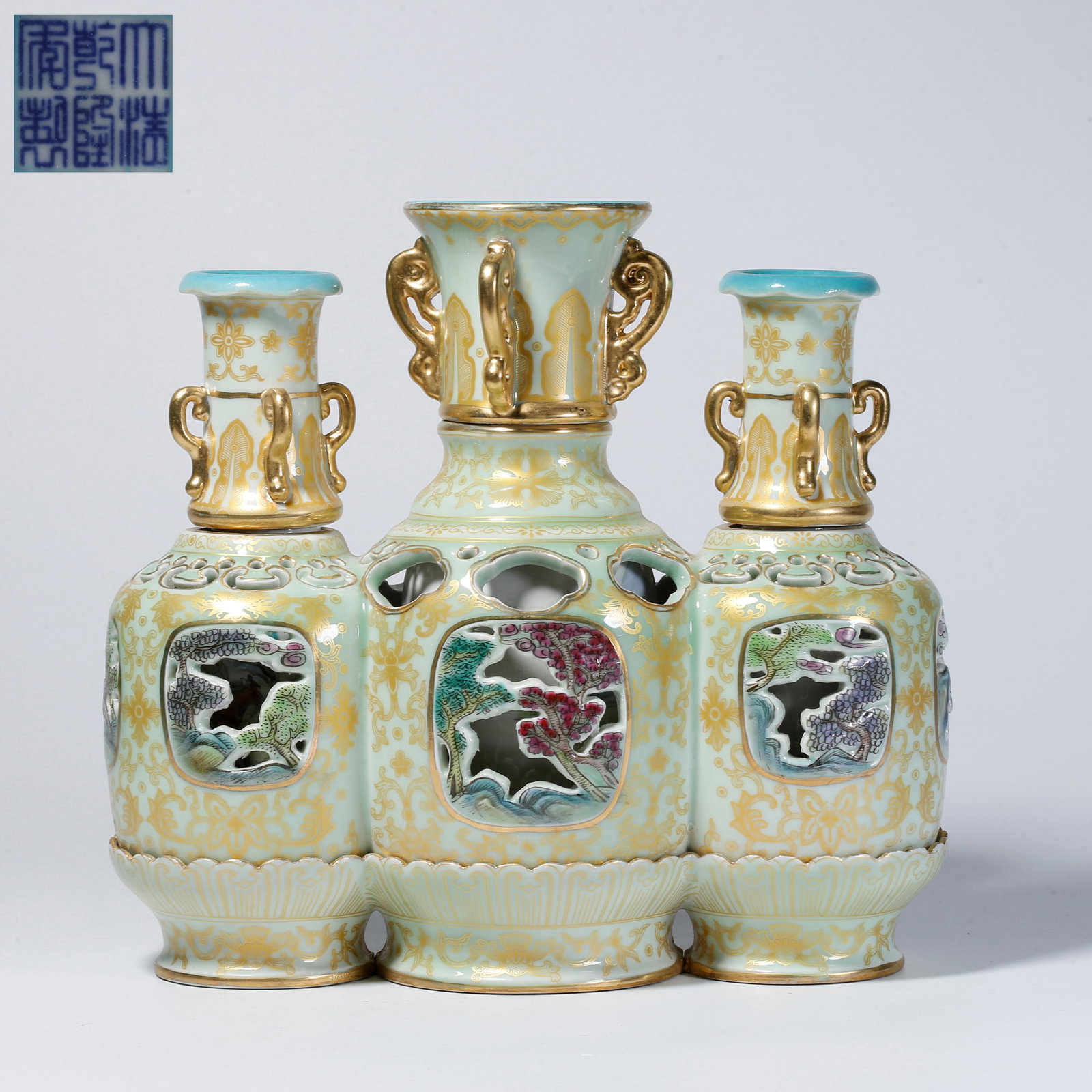 A FAMILLE-ROSE OPENWORK REVOLVING VASE (1 of 10)