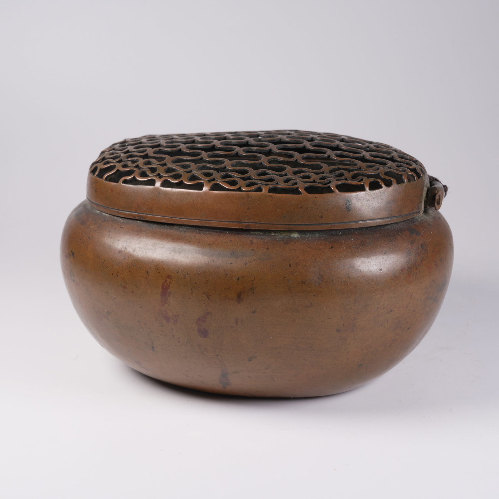 A BRONZE HAND WARMER (1 of 9)