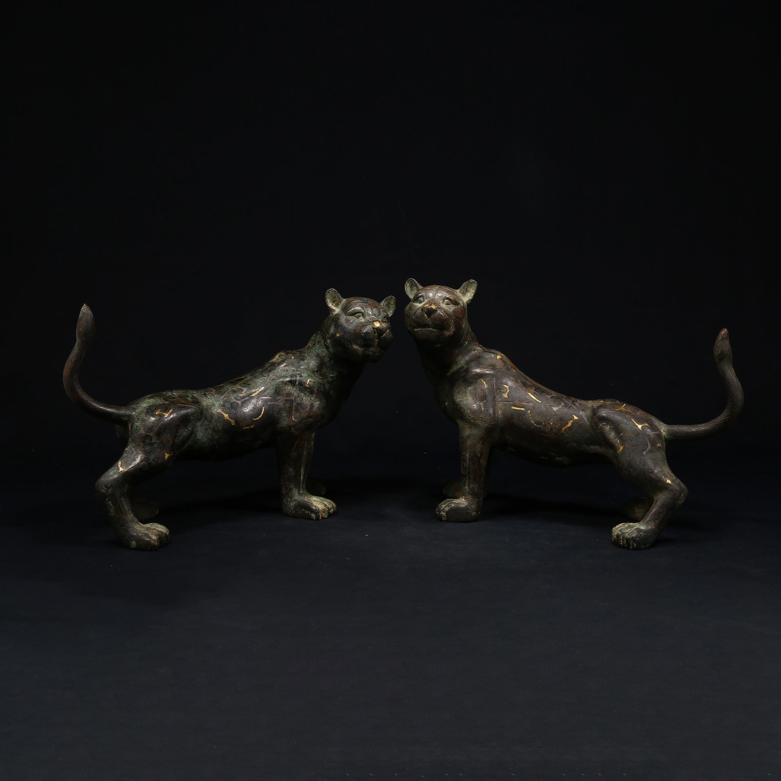 A SET OF BRONZE AUSPICIOUS BEASTS WITH GOLD AND SILVER INLAY: Set of Bronze Auspicious Beasts with Gold and Silver Inlay