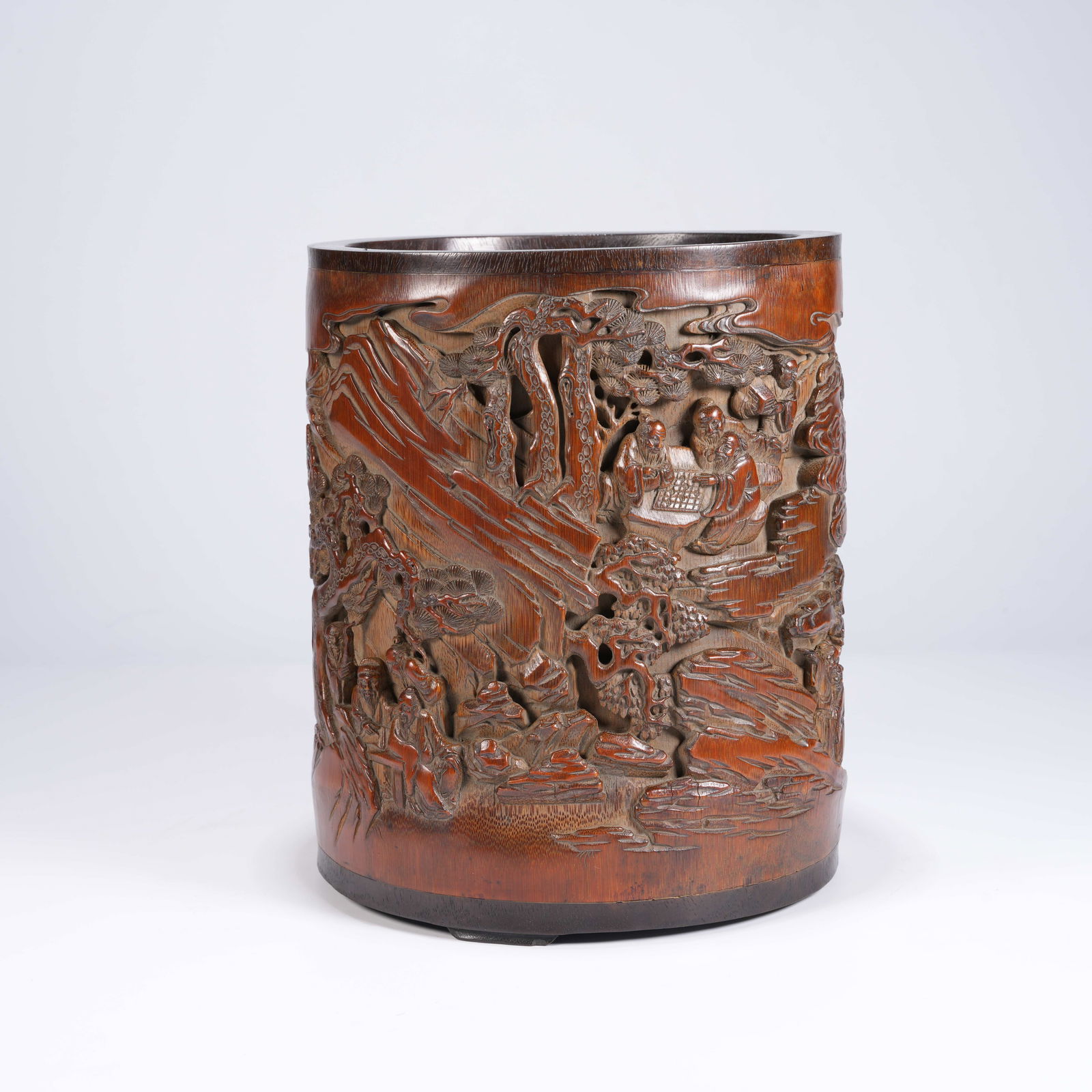 A BAMBOO CARVED "ELEGANT GATHERING UNDER PINE TREES" PAINTING BRUSH HOLDER: Bamboo Carved "Elegant Gathering under Pine Trees" Painting Brush Holder