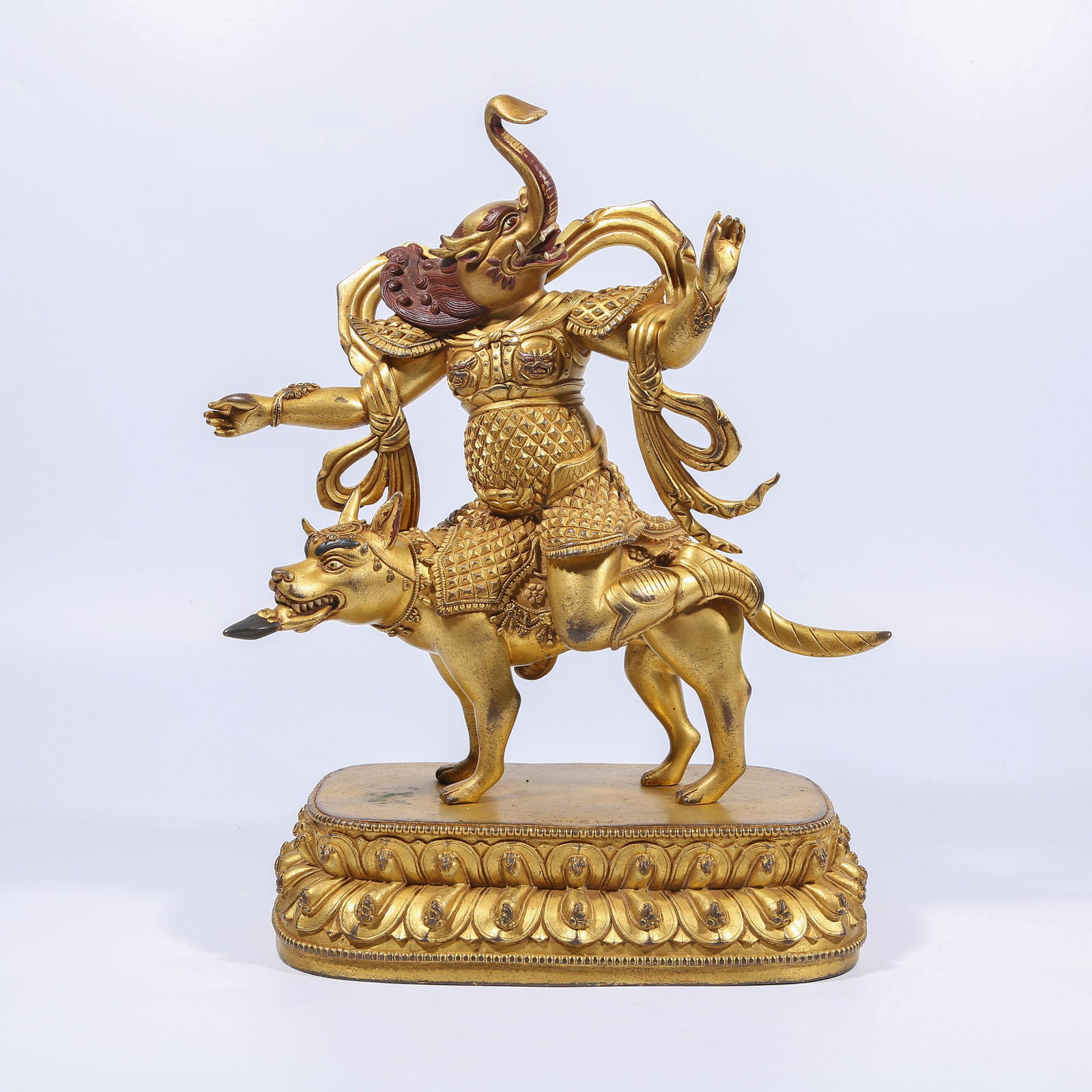 A GILT BRONZE DHARMA PROTECTOR STATUE: Gilt Bronze Dharma Protector Statue