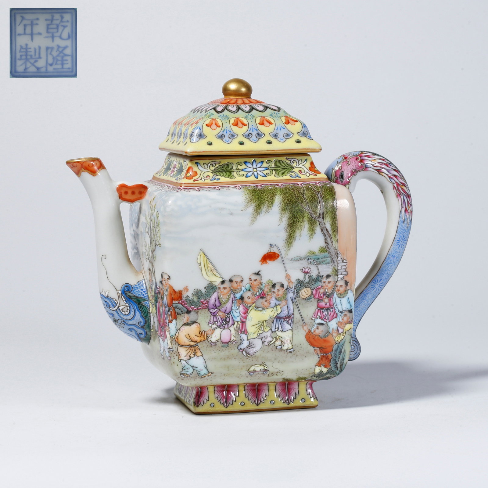 A FAMILLE-ROSE EWER WITH BOYS AT PLAY MOTIF: Famille-rose ewer with boys at play motif