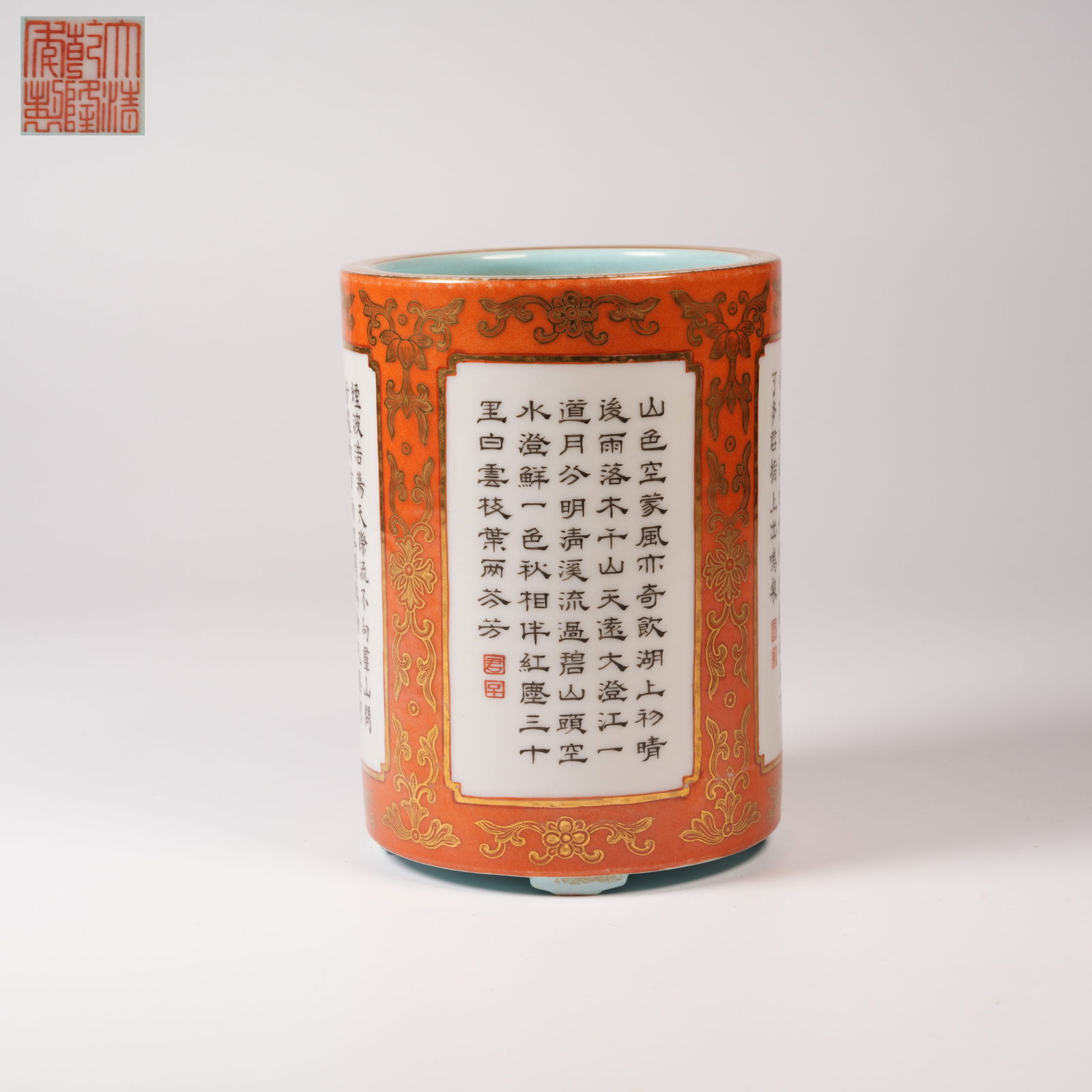 A RED-GROUND "OPEN-WINDOW" CARVED POETIC-INSCRIPTION BRUSH POT: Red-ground "open-window" carved poetic-inscription brush pot