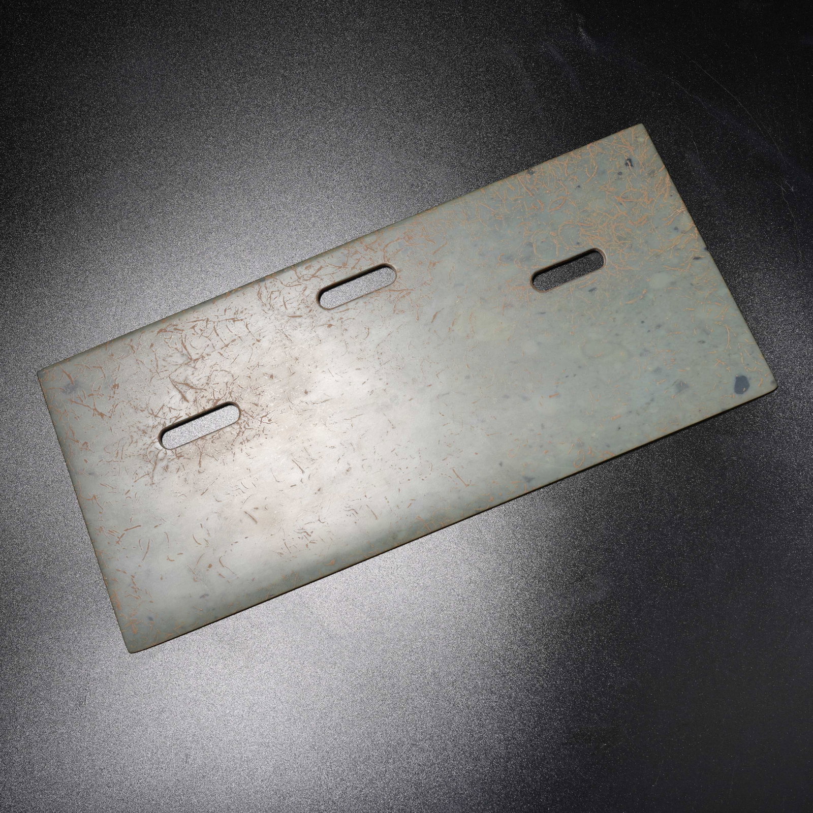 A ANCIENT JADE THREE-HOLED KNIFE: Ancient jade three-holed knife