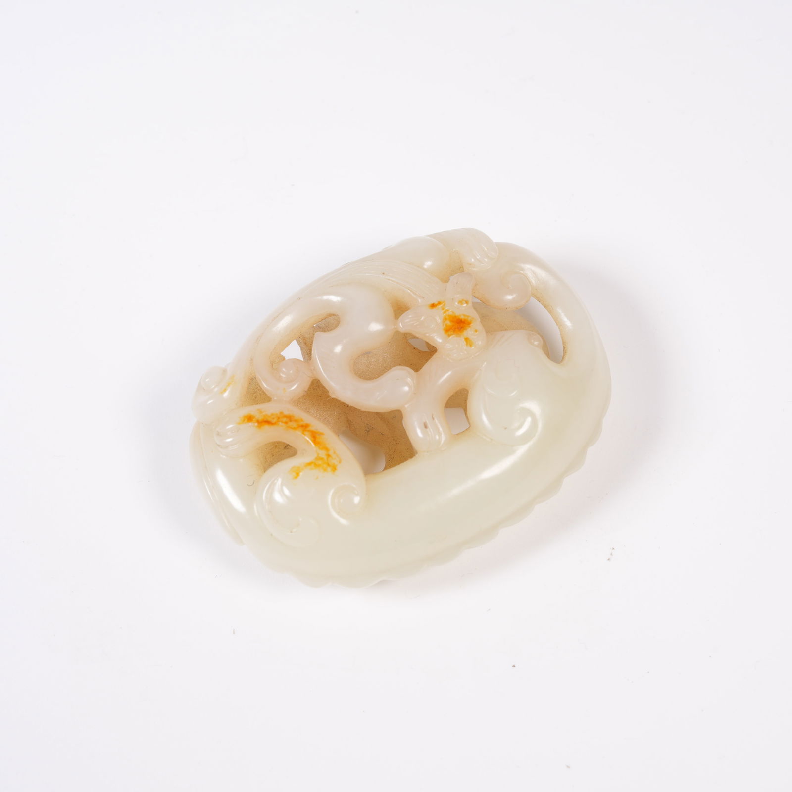 A ANCIENT JADE PENDANT WITH CHI DRAGON MOTIF (1 of 8)