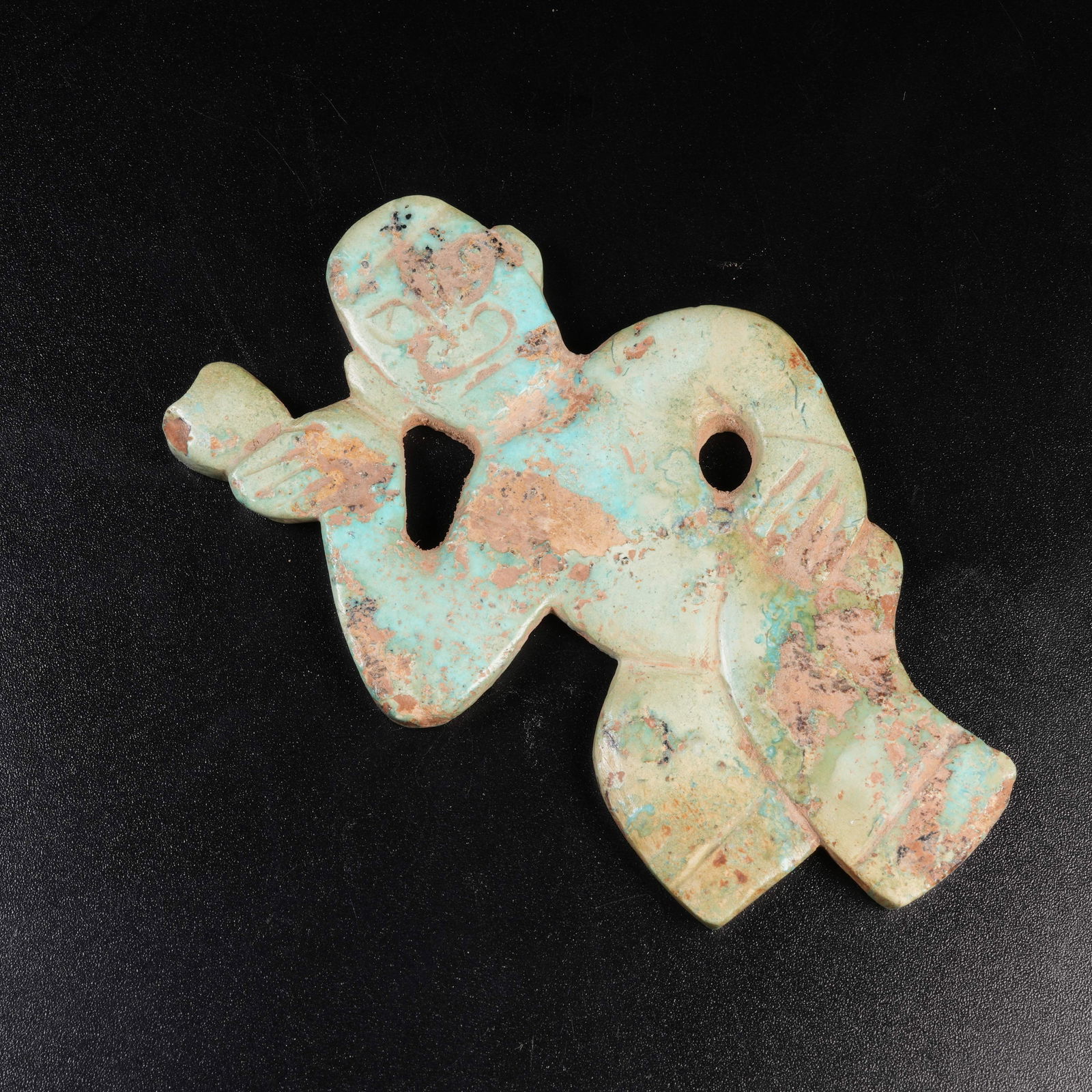 A TURQUOISE DIVINE HUMAN PENDANT: Turquoise divine human pendant