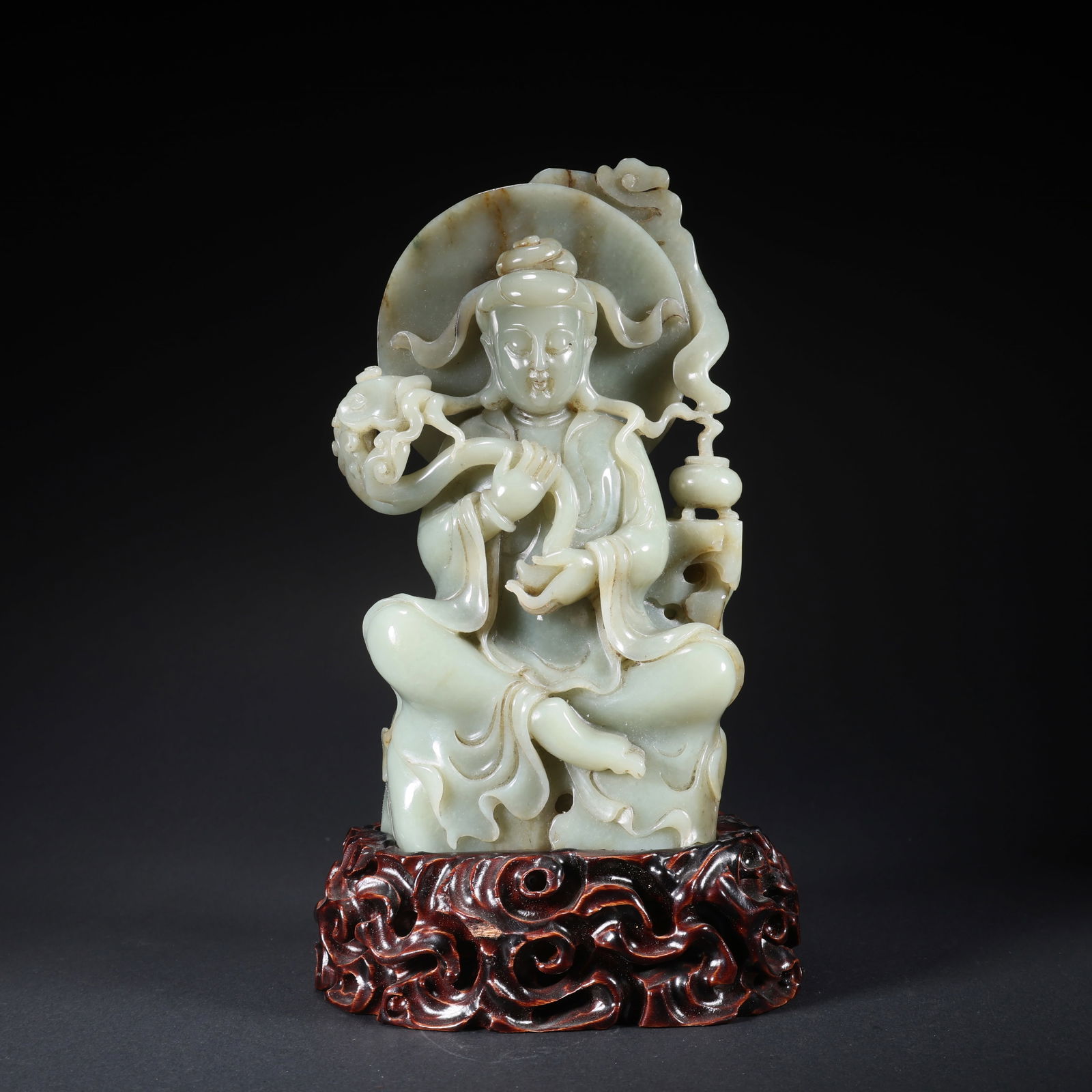 A HETIAN JADE SEATED GUANYIN WITH HALO (1 of 9)