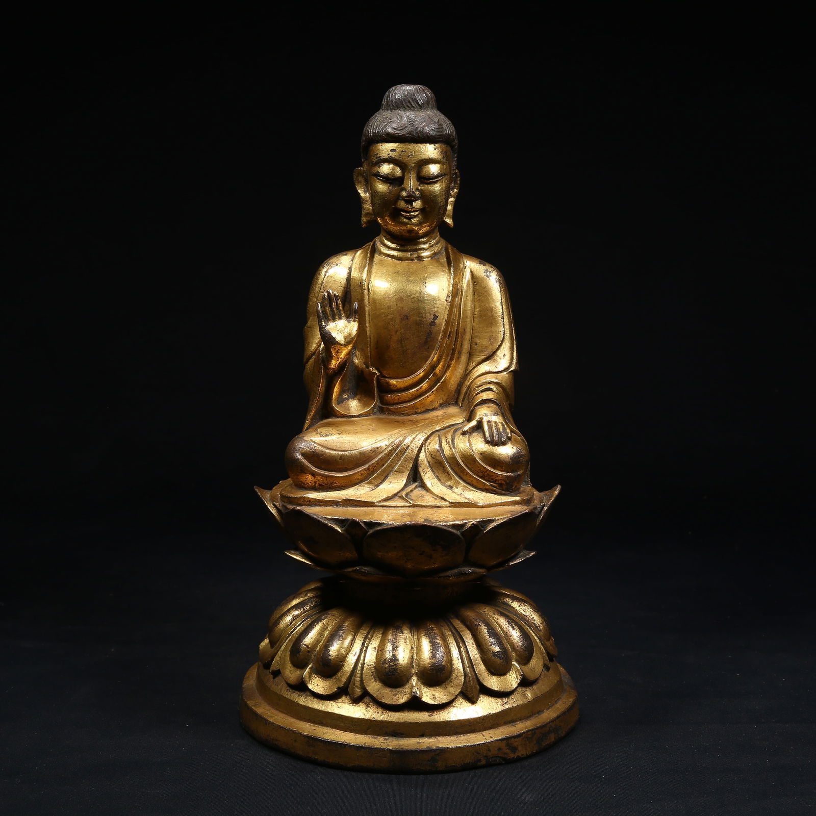 A GILT BRONZE AMOGHASIDDHI BUDDHA STATUE (1 of 8)