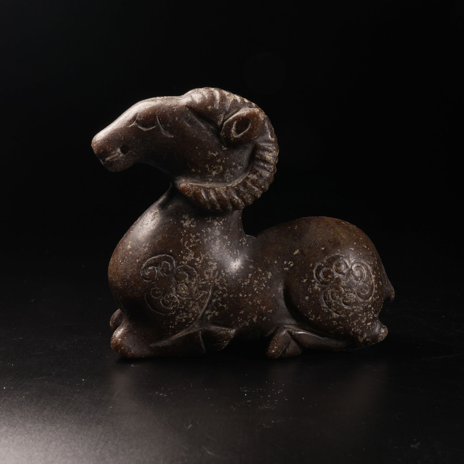 A ANCIENT JADE RECUMBENT SHEEP ORNAMENT: Ancient jade recumbent sheep ornament