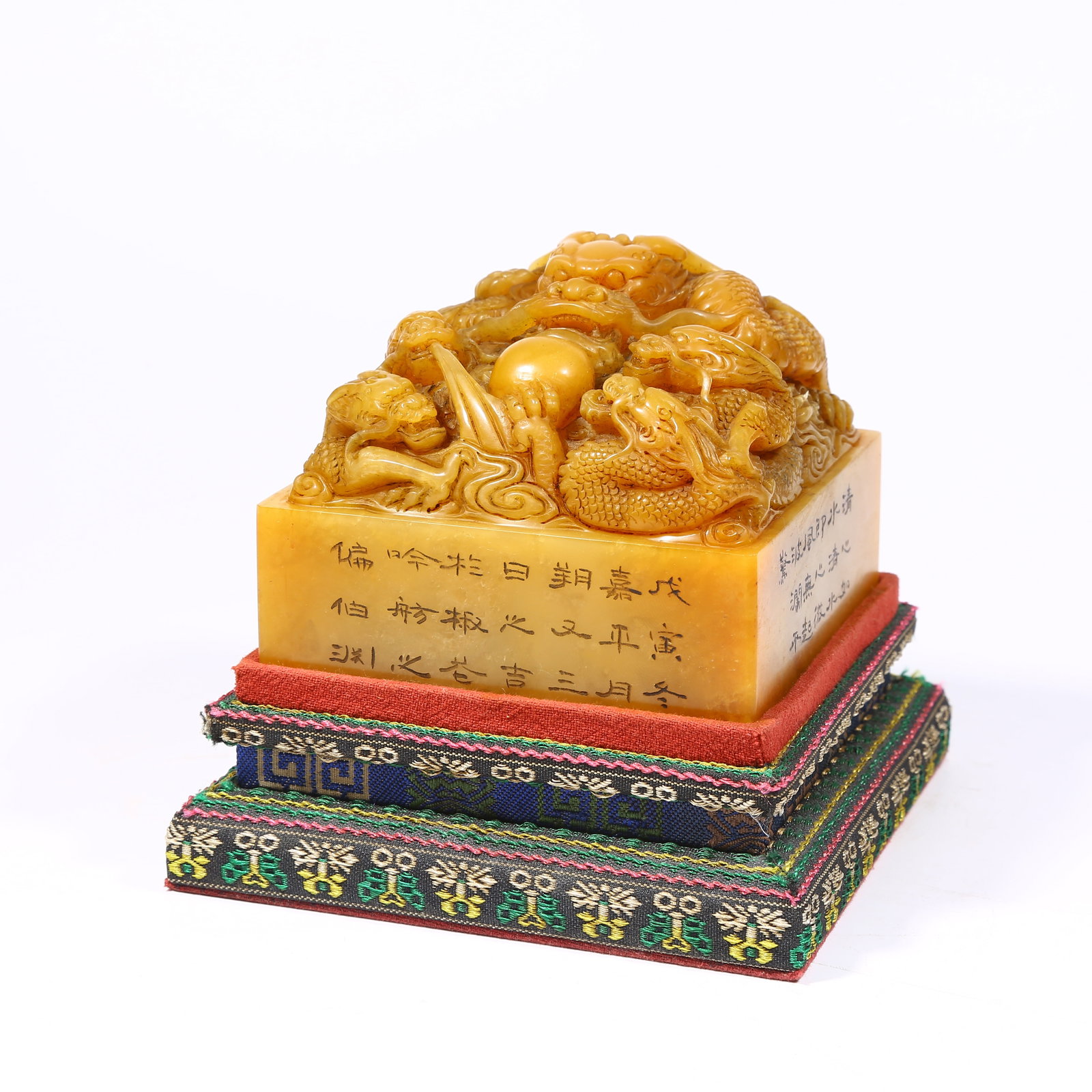 A SHOUSHAN TIANHUANG STONE SEAL WITH DRAGON KNOB: Shoushan Tianhuang stone seal with dragon knob