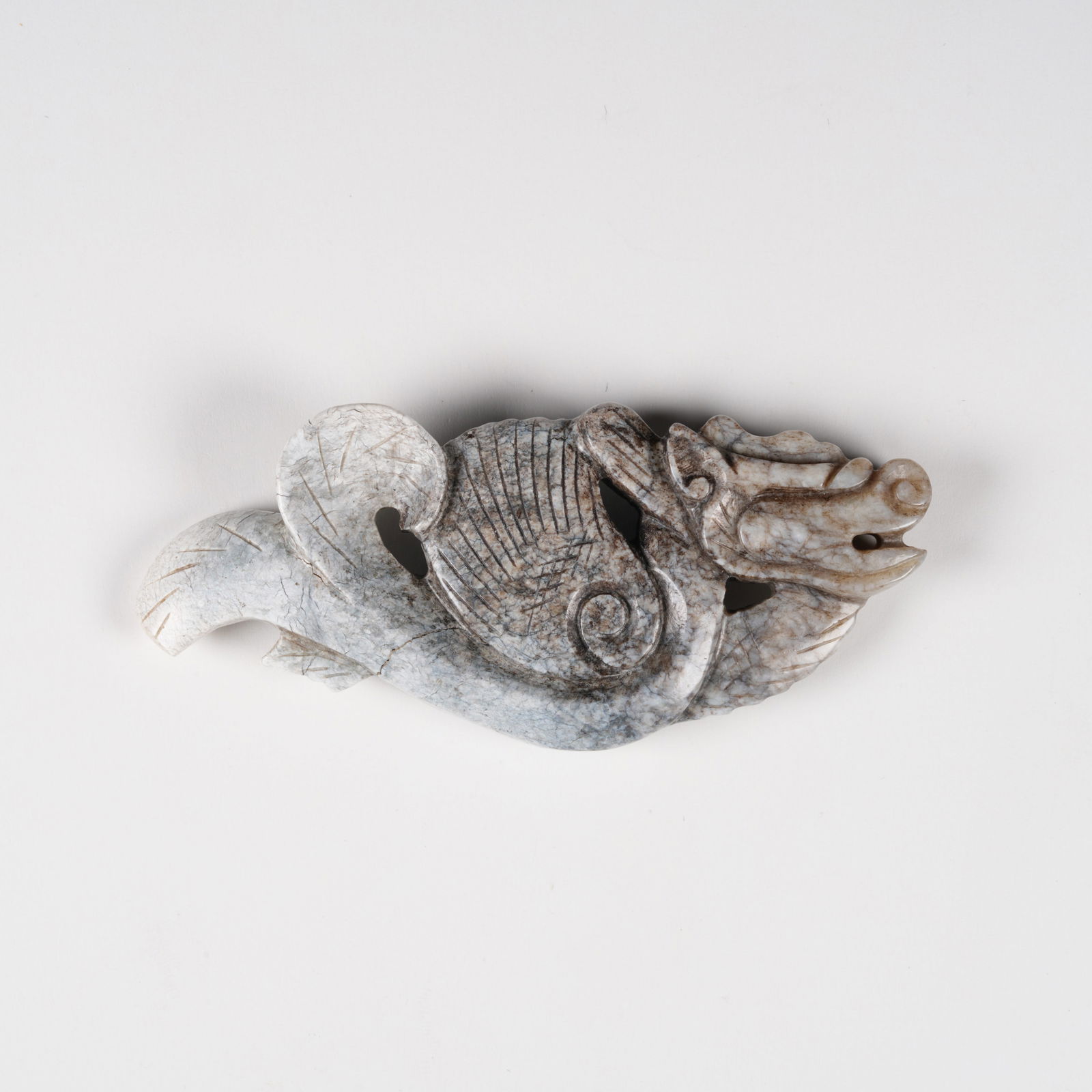 A HETIAN JADE MAKARA PENDANT: Hetian Jade Makara Pendant