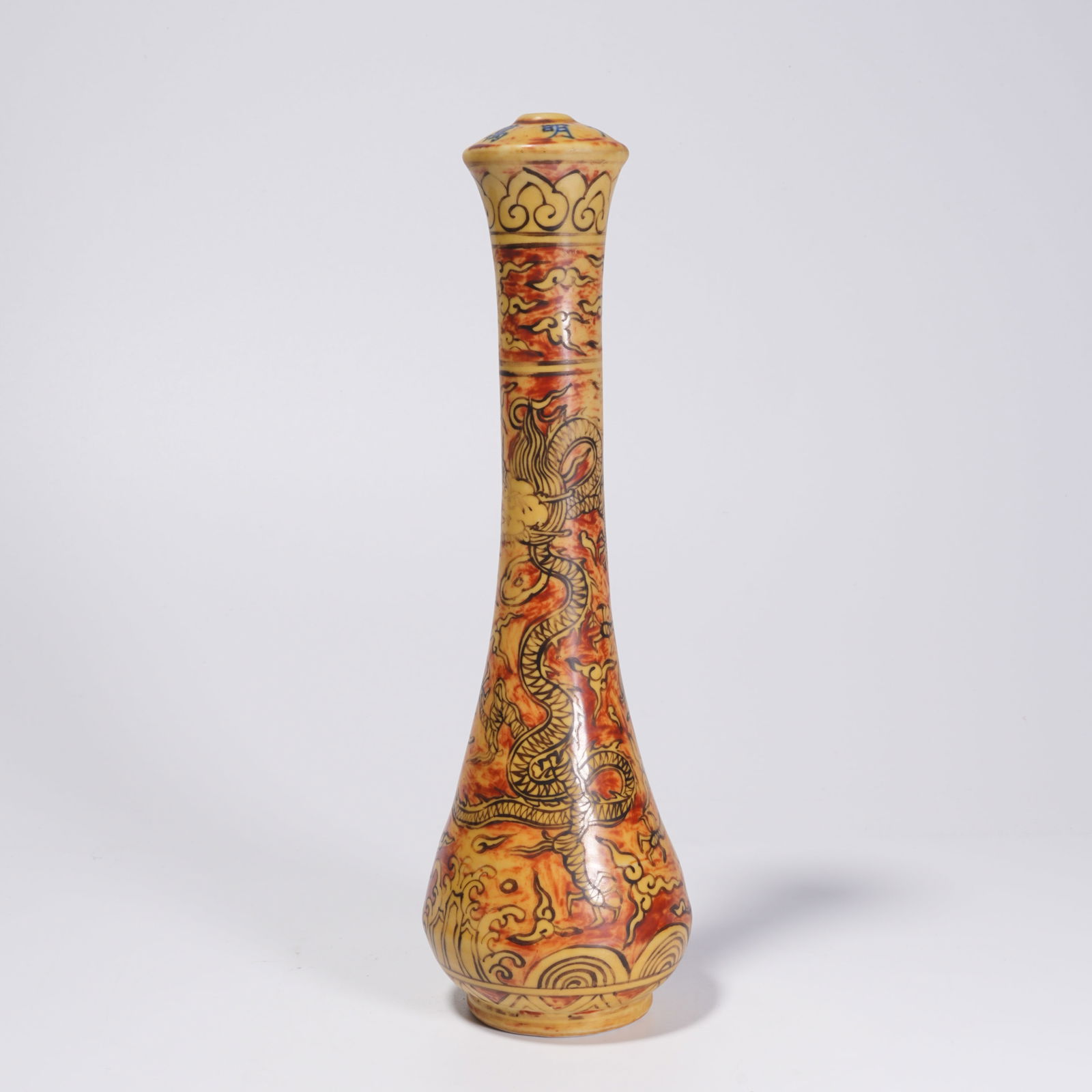 A YELLOW-GLAZED CLOUD AND DRAGON MOTIF INCENSE HOLDER: Yellow-Glazed Cloud and Dragon Motif Incense Holder