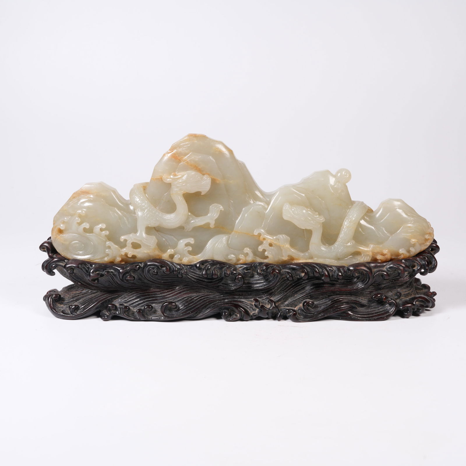 A HETIAN JADE MINIATURE BRUSH RACK WITH DRAGON MOTIF: Hetian jade miniature brush rack with dragon motif