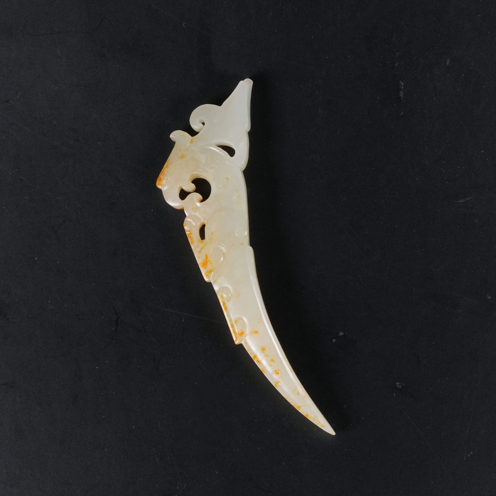 A HETIAN JADE XI (ARCHERY THUMB PENDANT): Hetian Jade Xi (Archery Thumb Pendant)