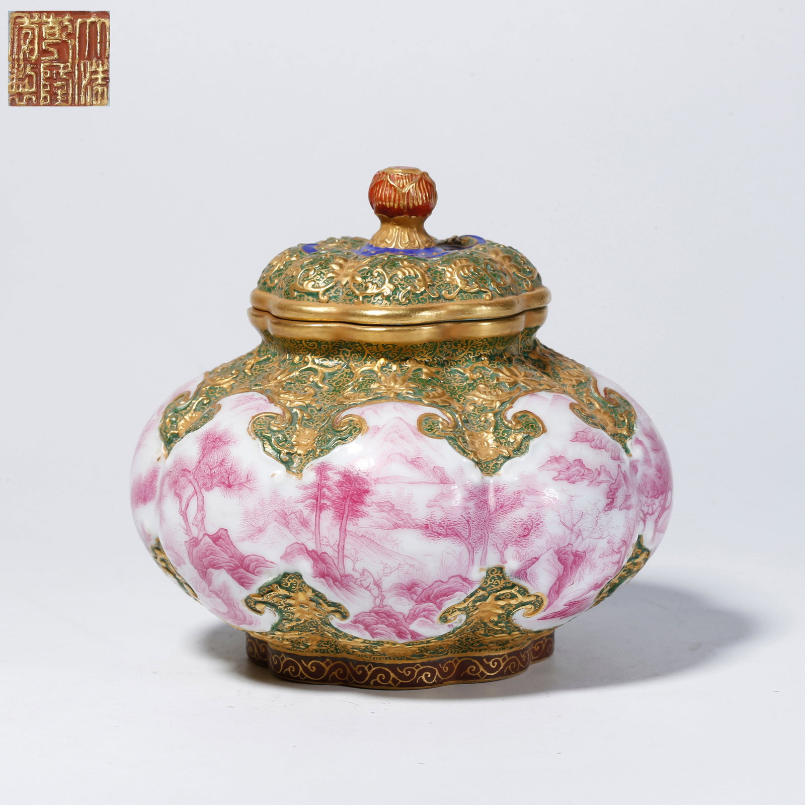 A UNDERGLAZE RED LIDDED JAR WITH LANDSCAPE AND FIGURE DESIGN: Underglaze red lidded jar with landscape and figure design