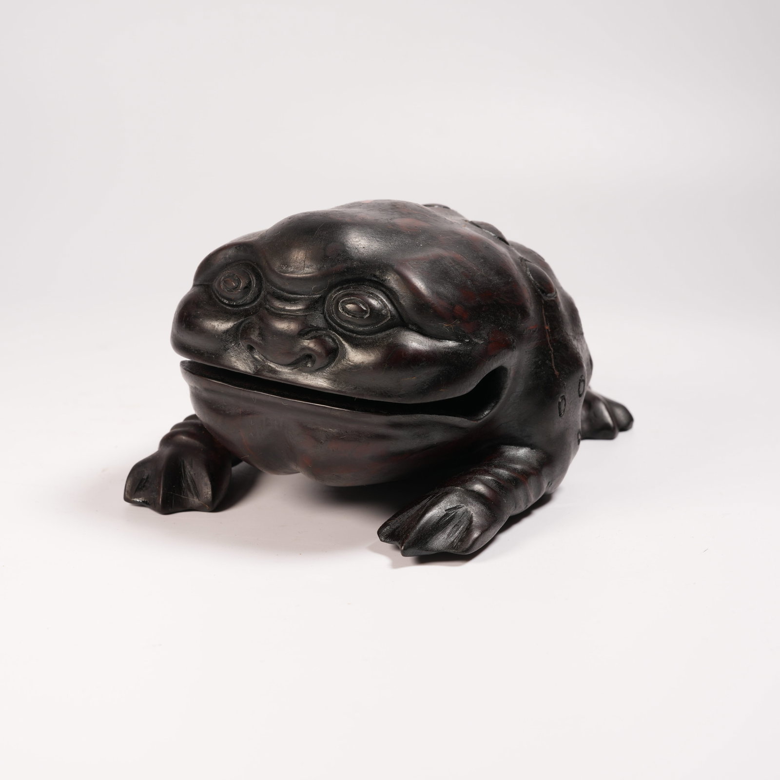 A ZITAN GOLDEN TOAD FIGURINE: Zitan Golden Toad Figurine