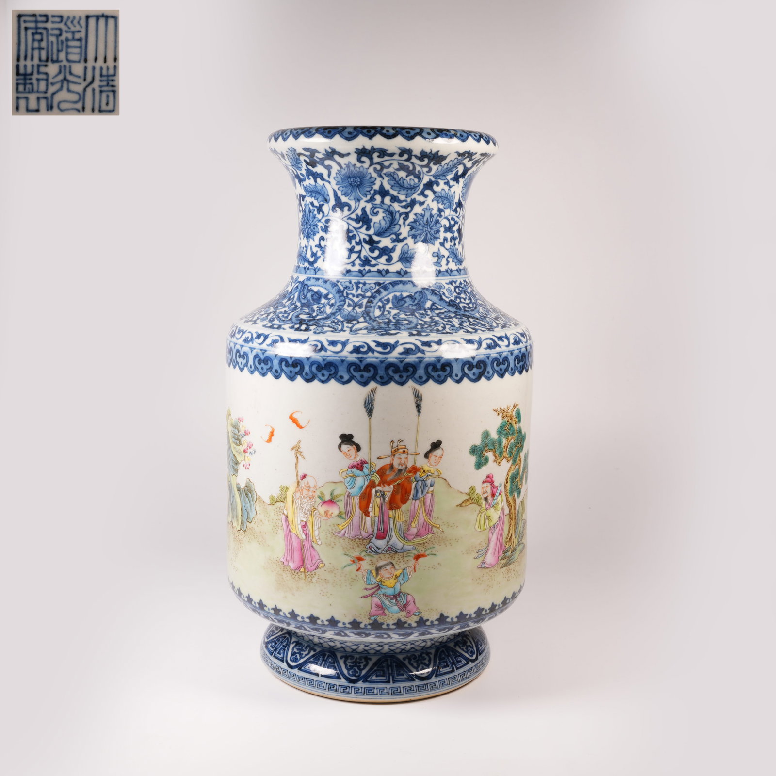 A BLUE-AND-WHITE "OPEN-WINDOW" FAMILLE ROSE ZUN WITH FIGURE STORY MOTIF: Blue-and-white "open-window" famille rose zun with figure story motif