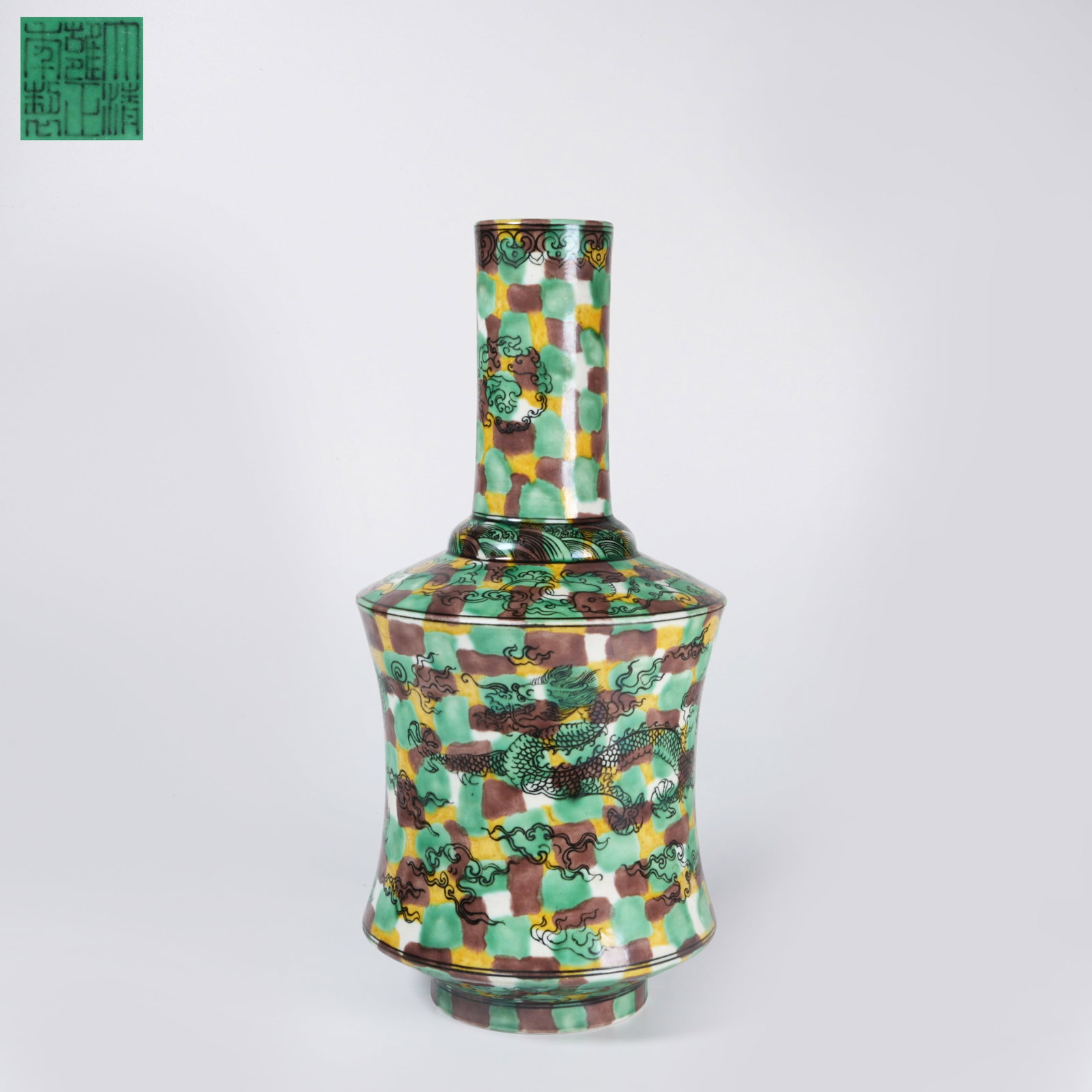 A PLAIN SANCAI "CLOUD AND DRAGON" REWARD VASE: Plain sancai "cloud and dragon" reward vase